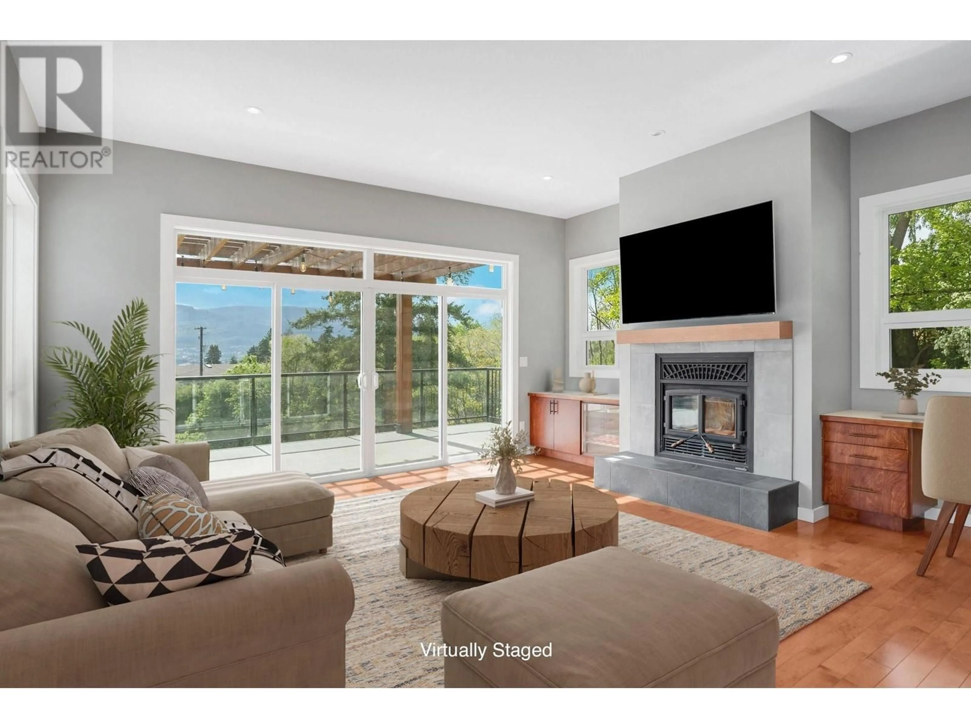 Living room with furniture, unknown for 220 WEST BENCH DRIVE, Penticton British Columbia V2A8X8