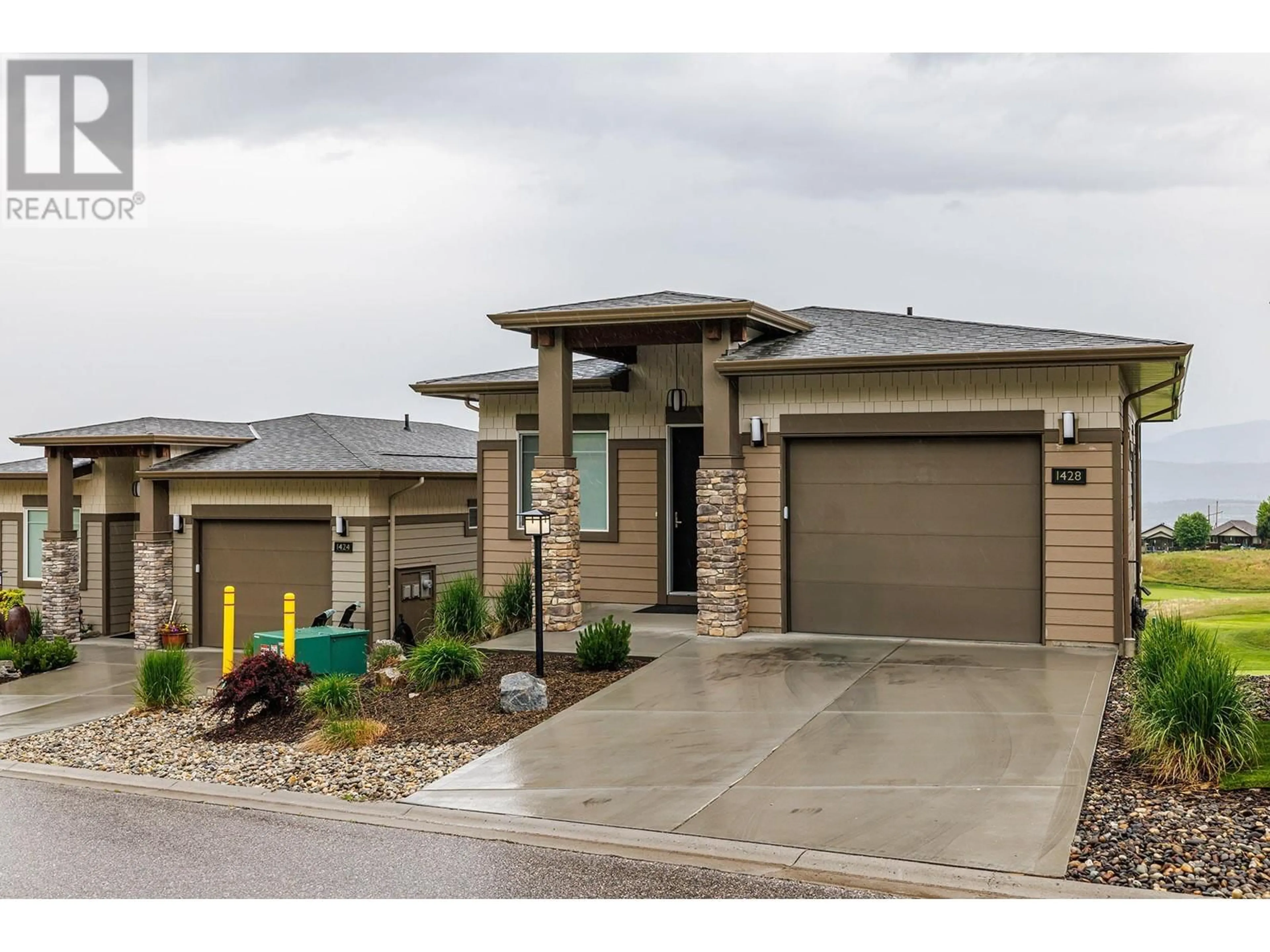 Home with brick exterior material, street for 1428 TOWER RANCH DRIVE, Kelowna British Columbia V1P1T8