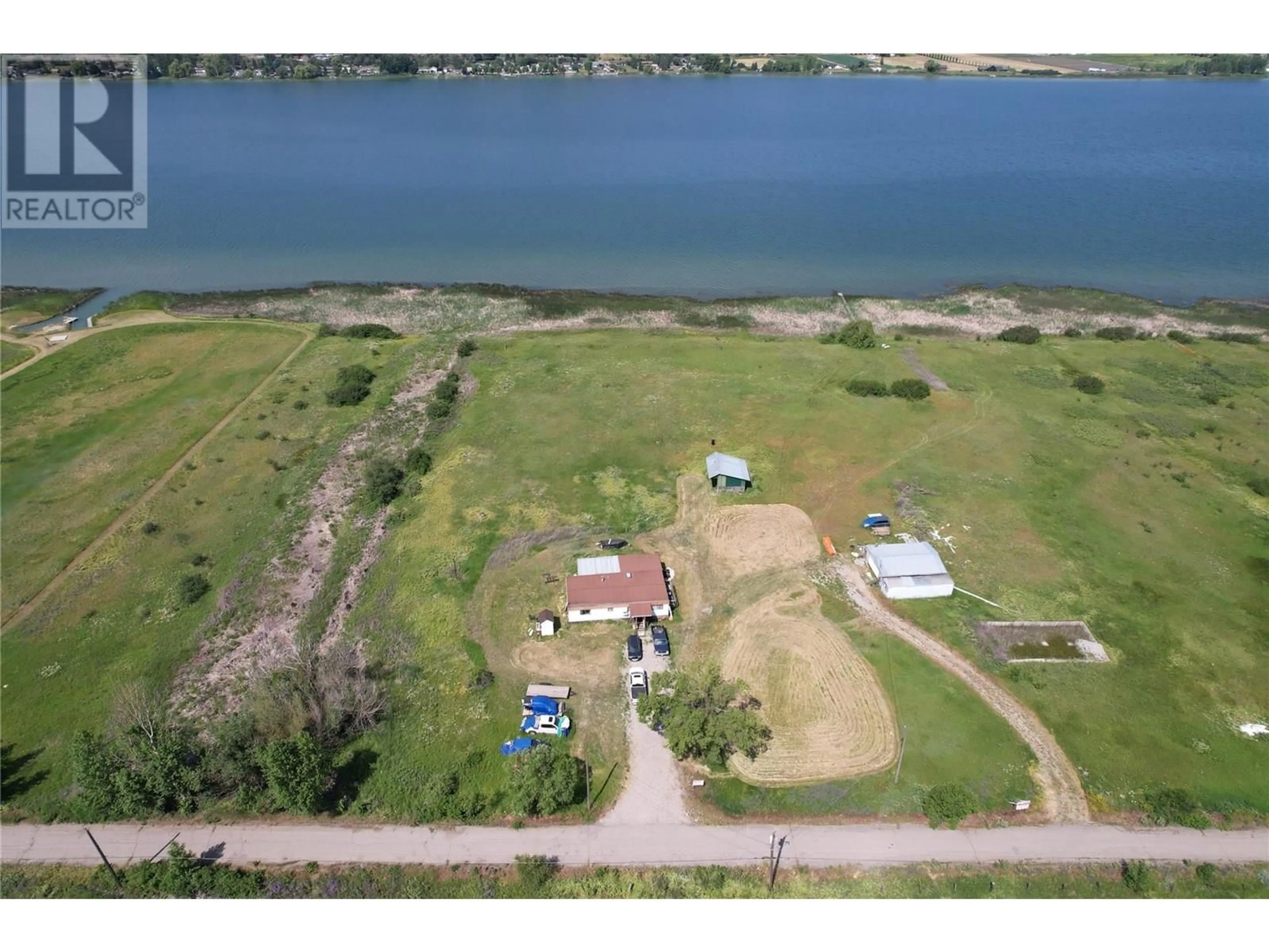 A pic from outside/outdoor area/front of a property/back of a property/a pic from drone, water/lake/river/ocean view for 7340 CRANE ROAD, Vernon British Columbia V1B3R6