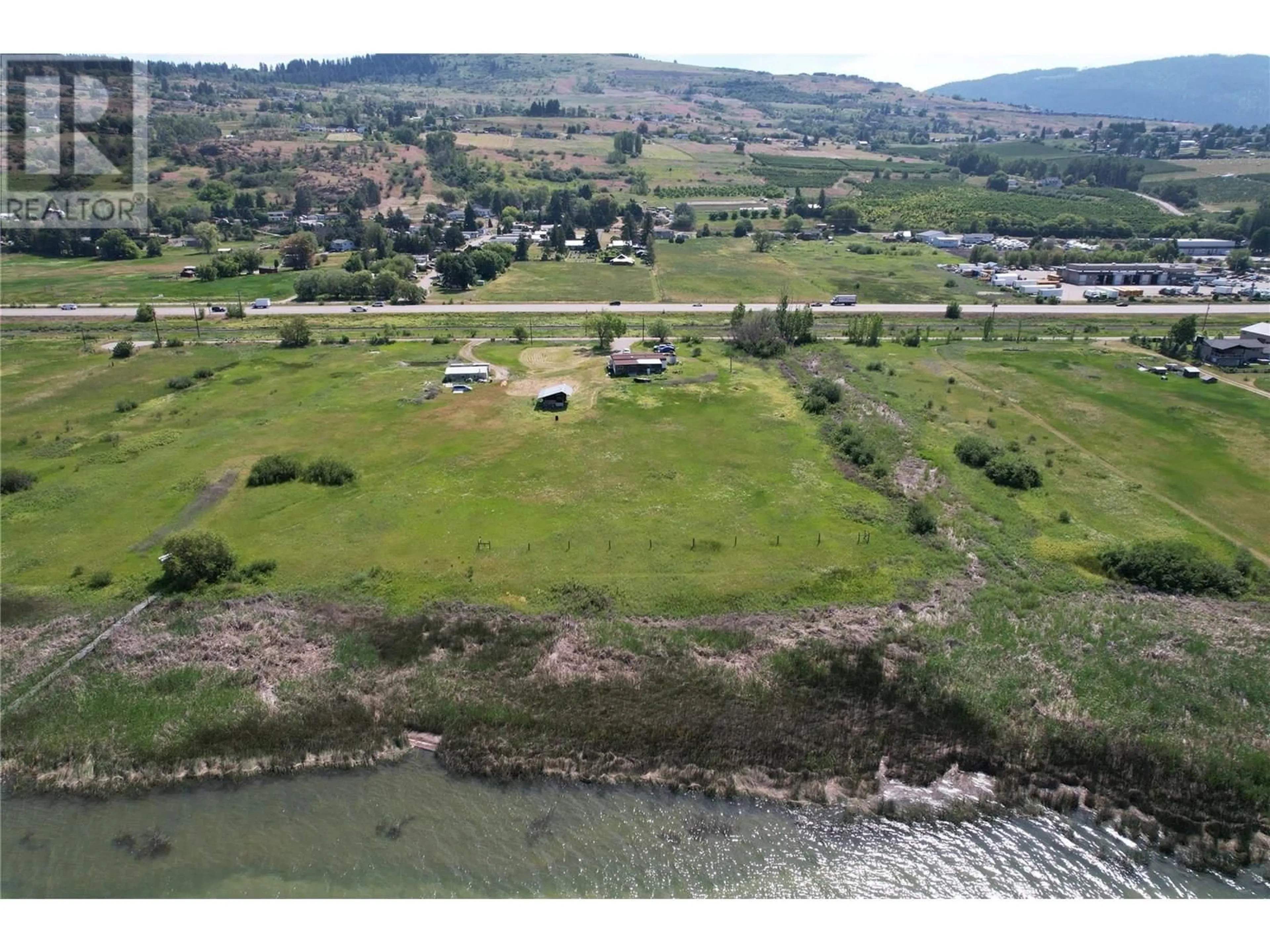 A pic from outside/outdoor area/front of a property/back of a property/a pic from drone, water/lake/river/ocean view for 7340 CRANE ROAD, Vernon British Columbia V1B3R6