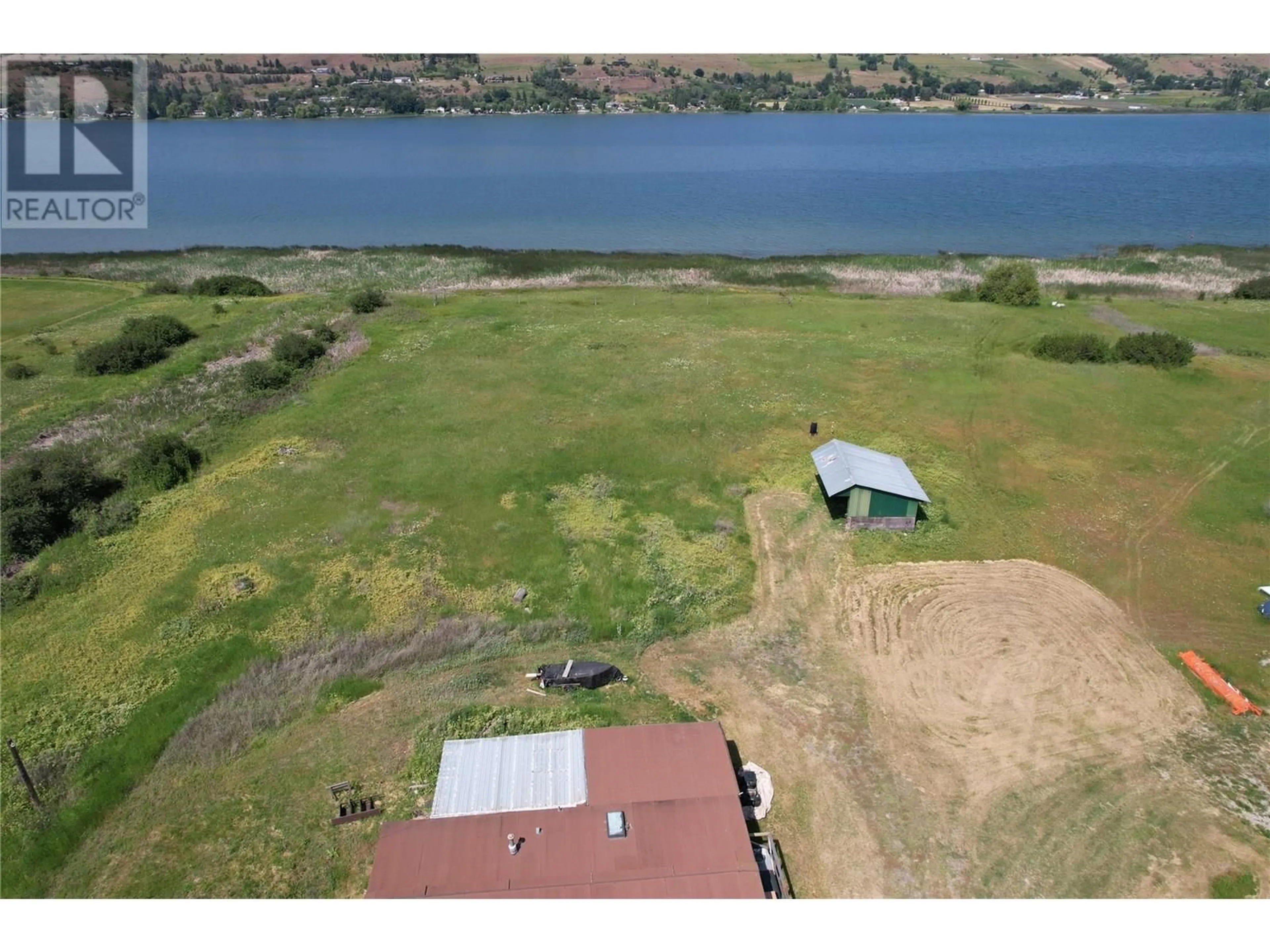 A pic from outside/outdoor area/front of a property/back of a property/a pic from drone, water/lake/river/ocean view for 7340 CRANE ROAD, Vernon British Columbia V1B3R6