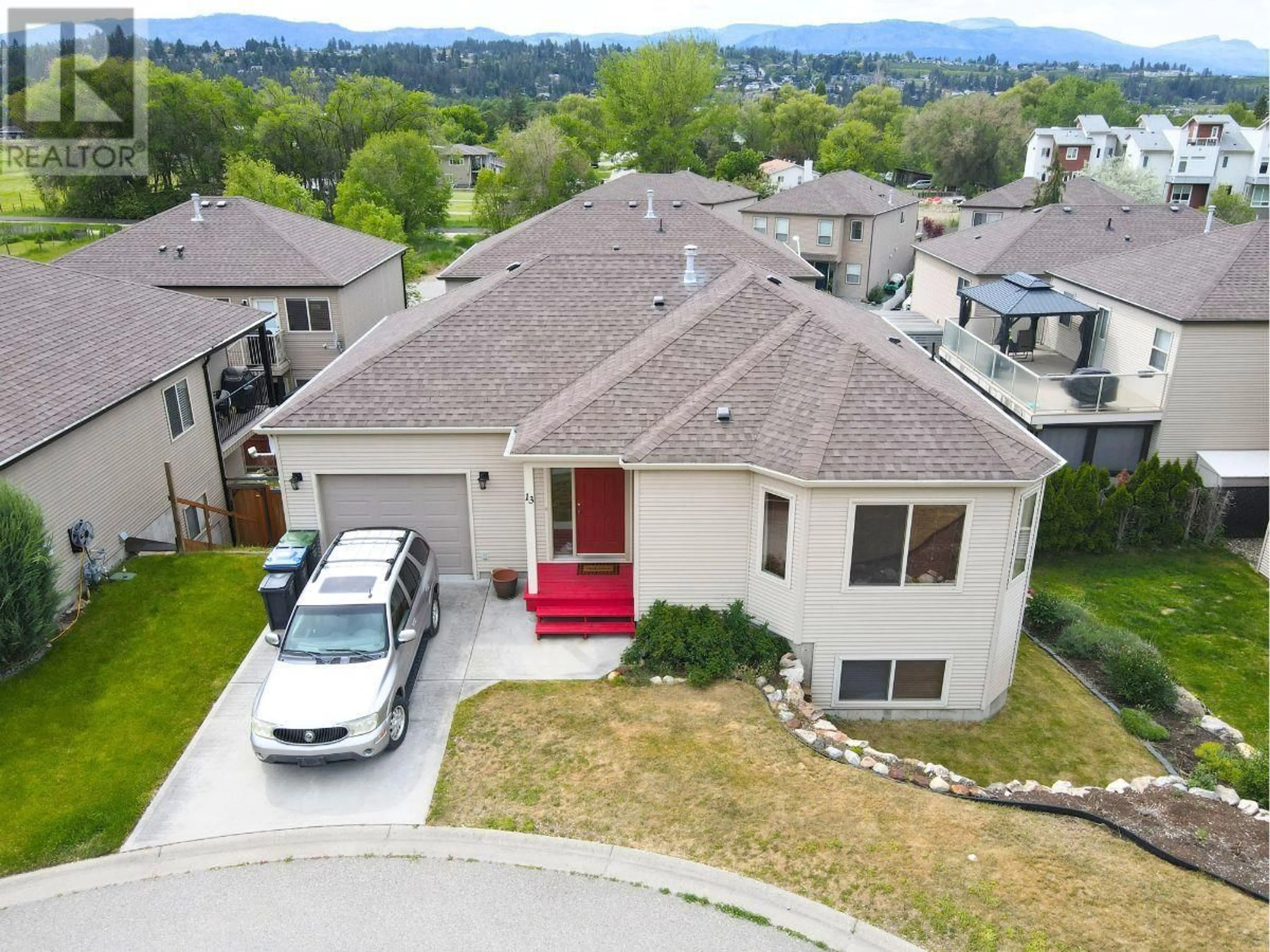 A pic from outside/outdoor area/front of a property/back of a property/a pic from drone, street for 13 - 11392 LODGE ROAD, Lake Country British Columbia V4V1X2