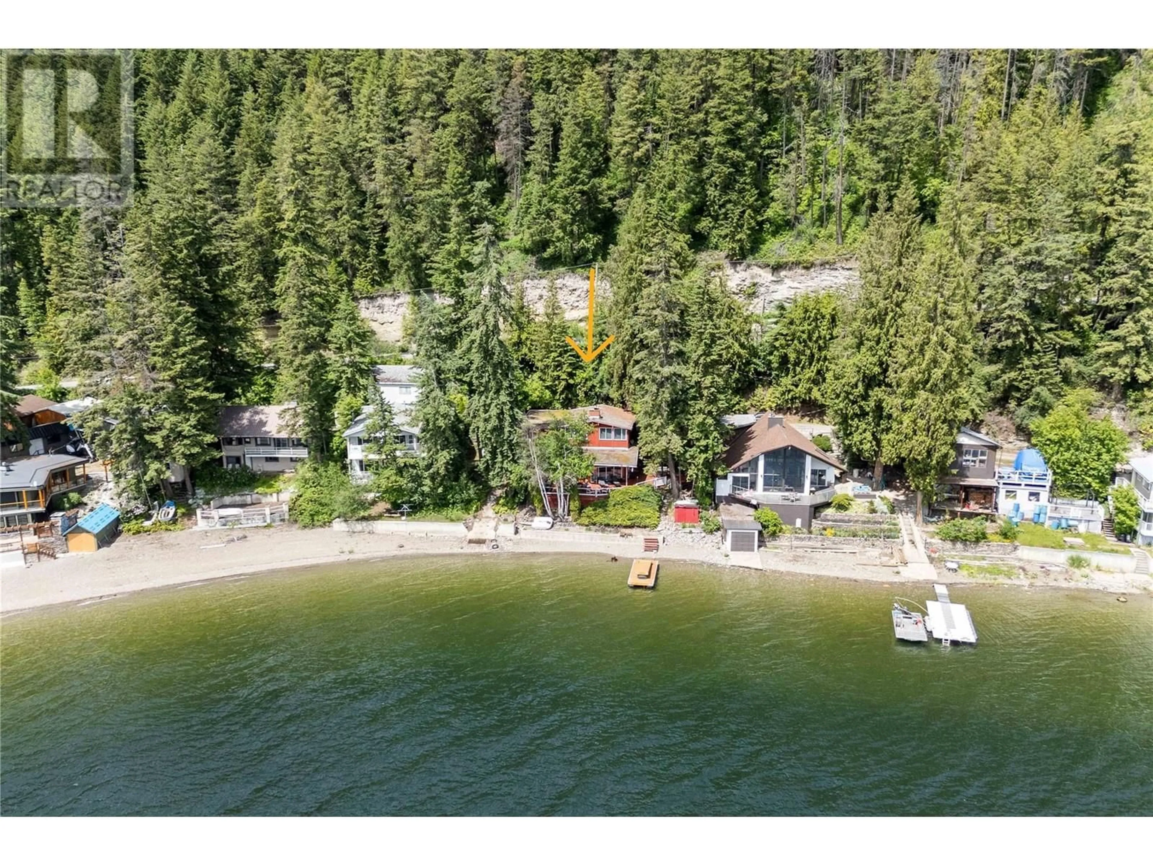 A pic from outside/outdoor area/front of a property/back of a property/a pic from drone, water/lake/river/ocean view for 4750 SUNNYBRAE CANOE POINT ROAD, Tappen British Columbia V0E2W0