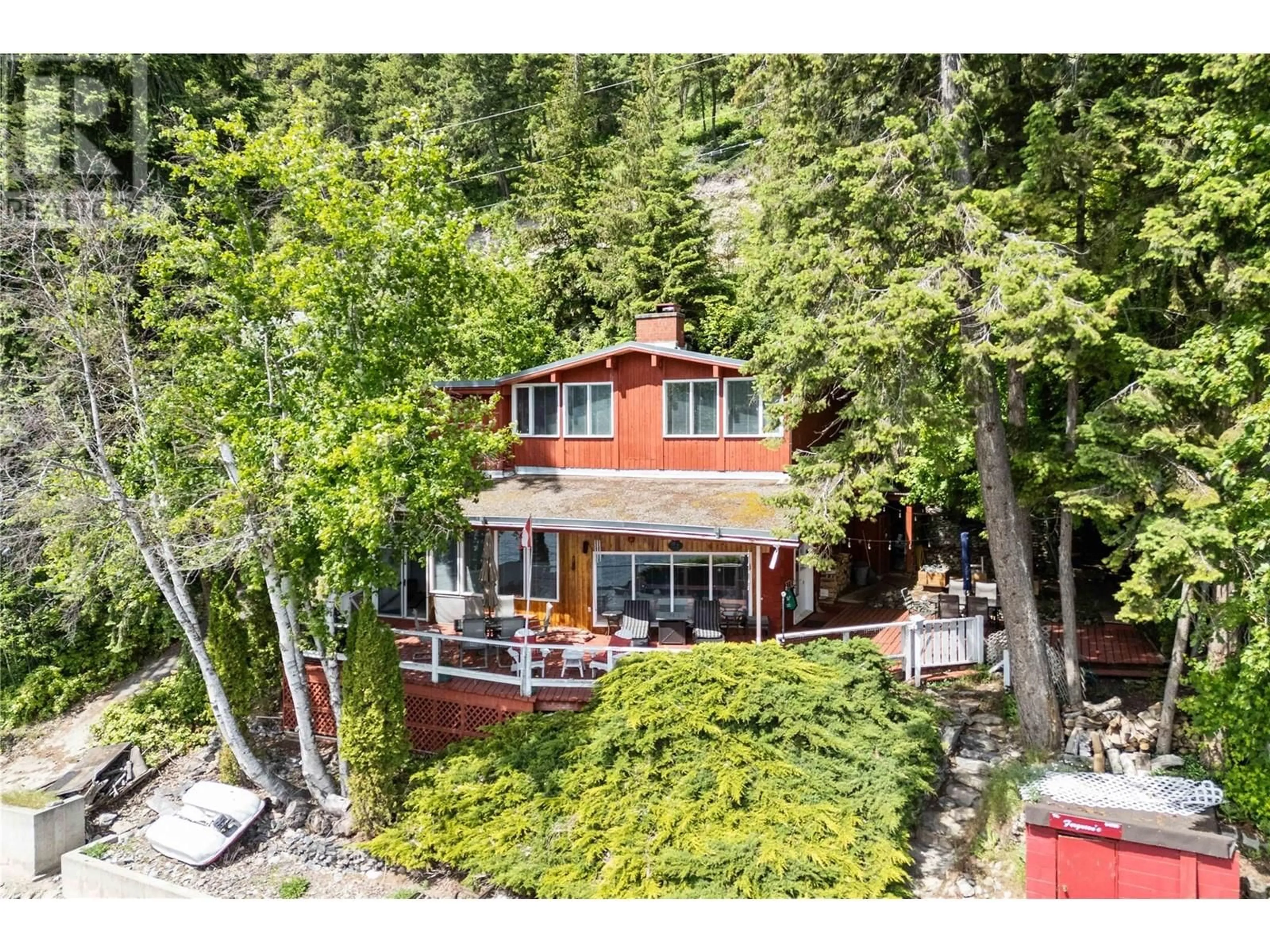 A pic from outside/outdoor area/front of a property/back of a property/a pic from drone, water/lake/river/ocean view for 4750 SUNNYBRAE CANOE POINT ROAD, Tappen British Columbia V0E2W0