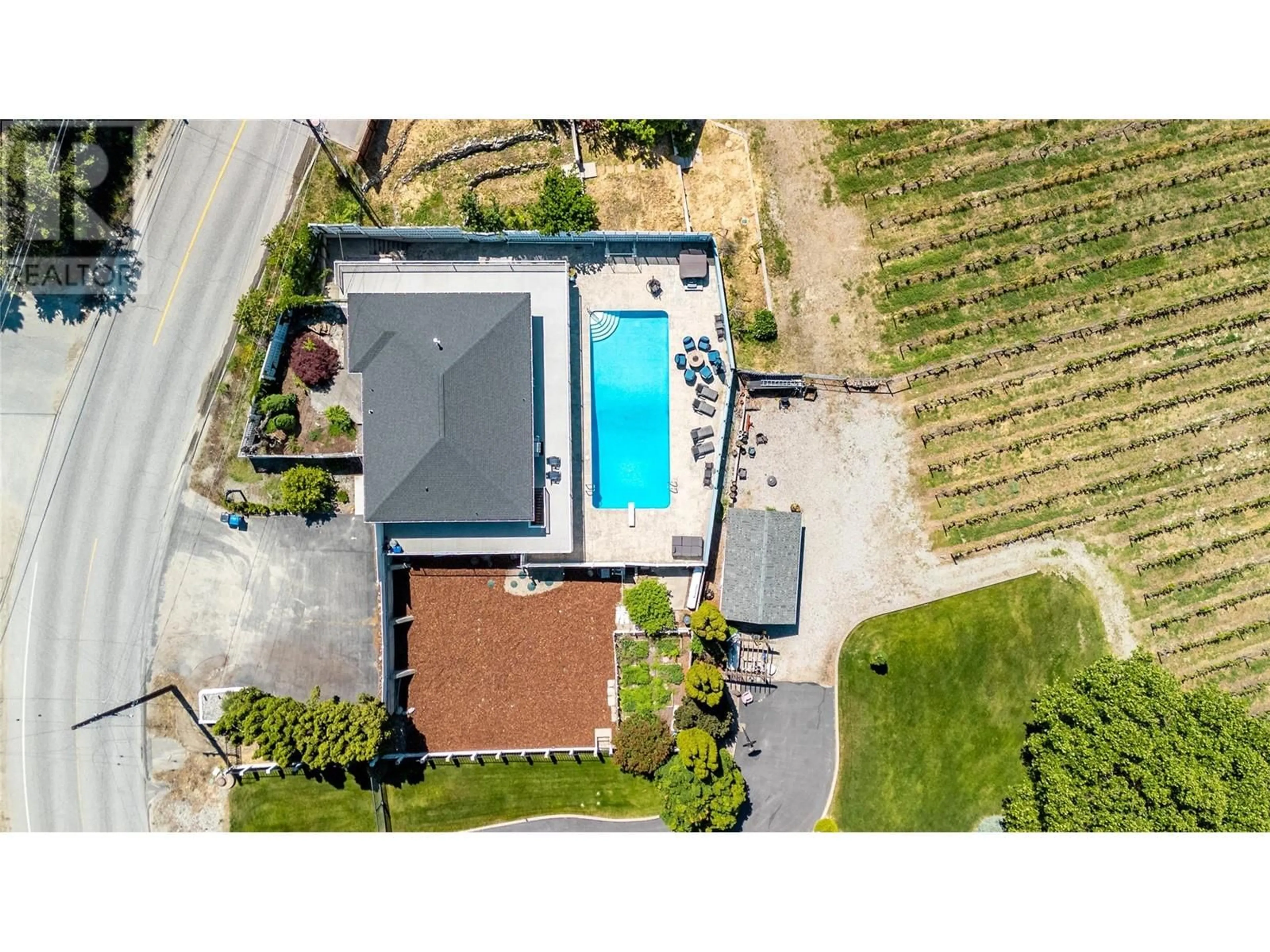 A pic from outside/outdoor area/front of a property/back of a property/a pic from drone, street for 2205 NARAMATA ROAD, Naramata British Columbia V0H1N1