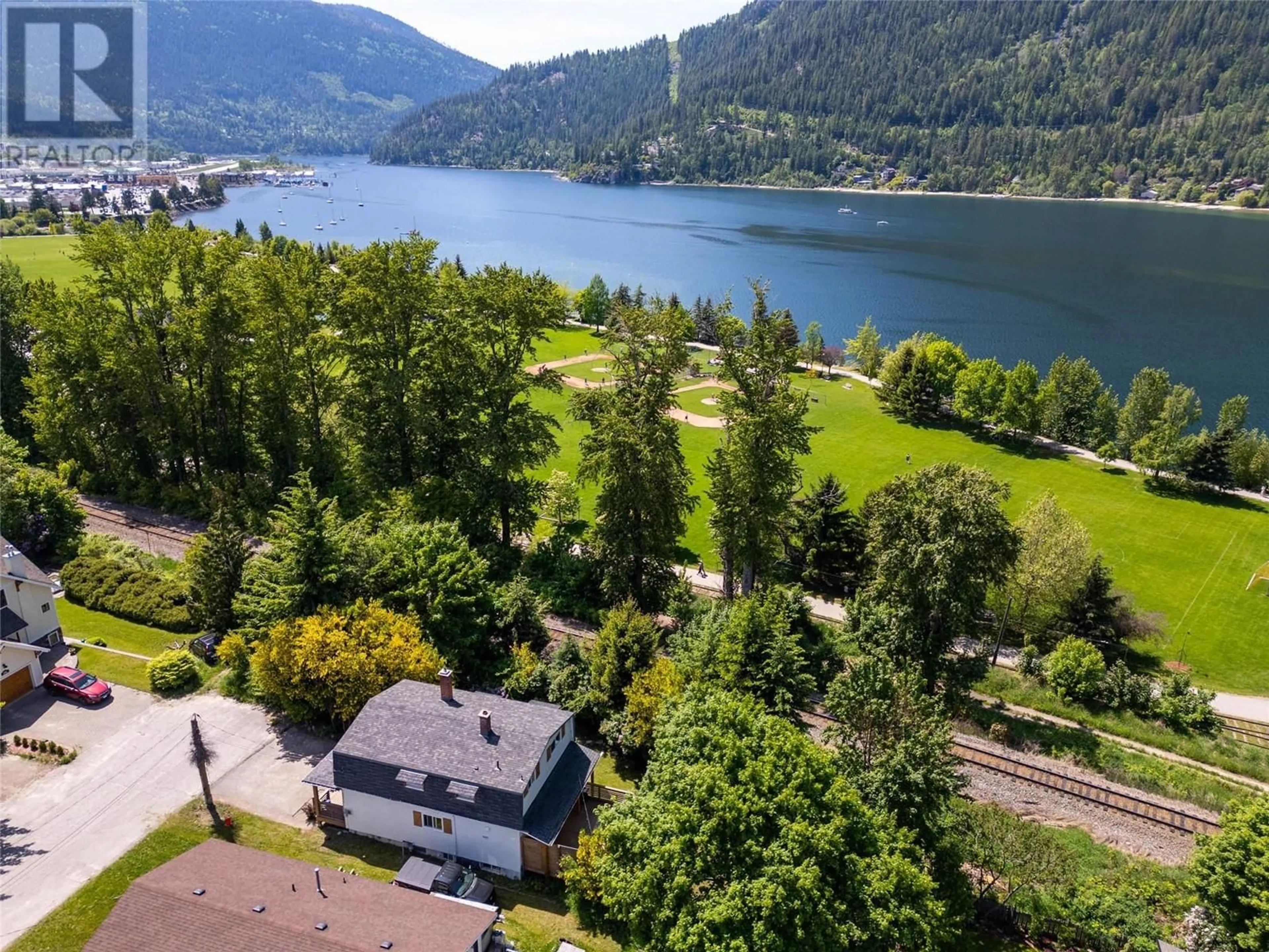 A pic from outside/outdoor area/front of a property/back of a property/a pic from drone, water/lake/river/ocean view for 311 ELWYN STREET, Nelson British Columbia V1L3R4