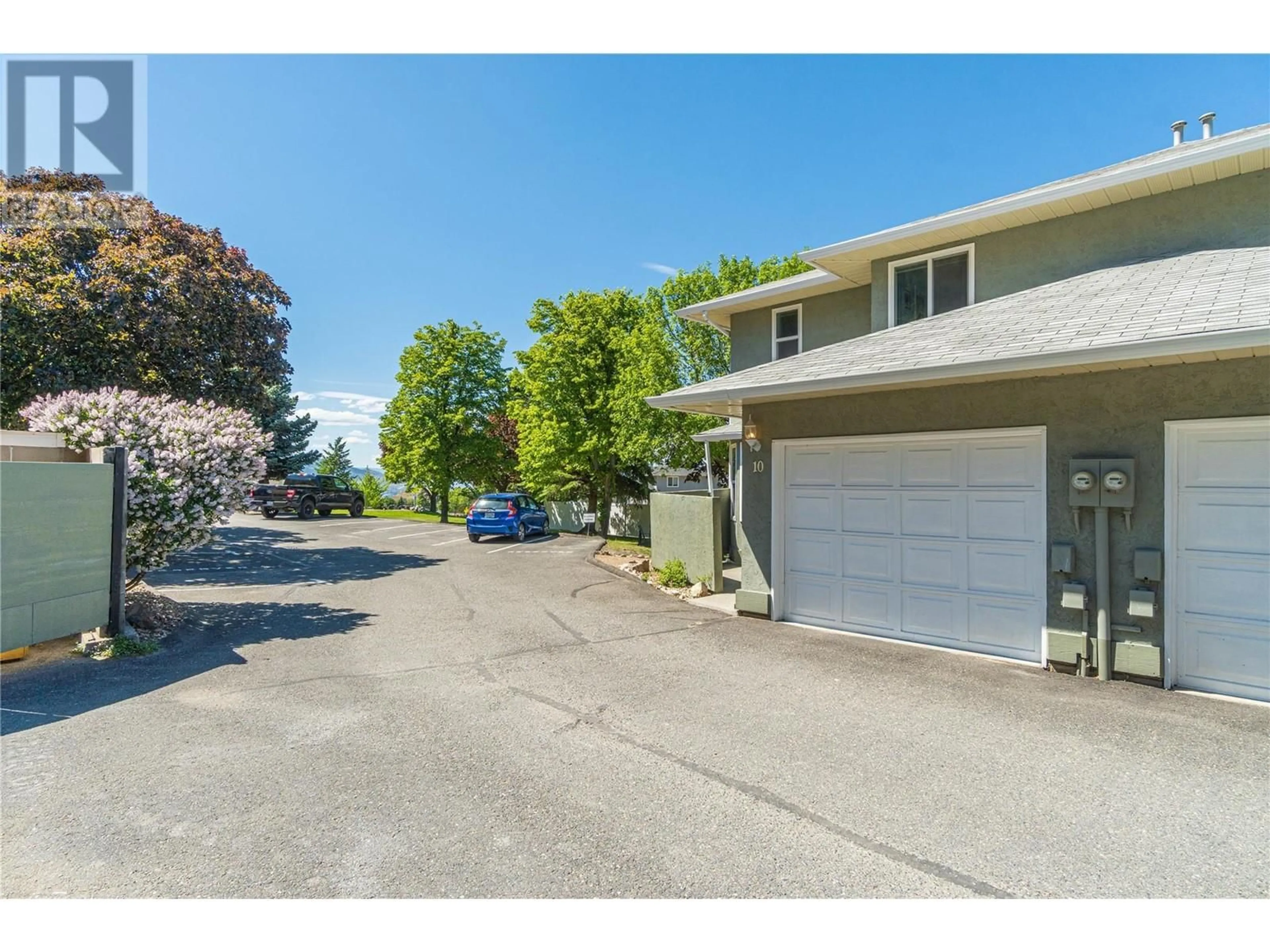 A pic from outside/outdoor area/front of a property/back of a property/a pic from drone, unknown for 10 - 2526 NECHAKO DRIVE, Kamloops British Columbia V2E2C9