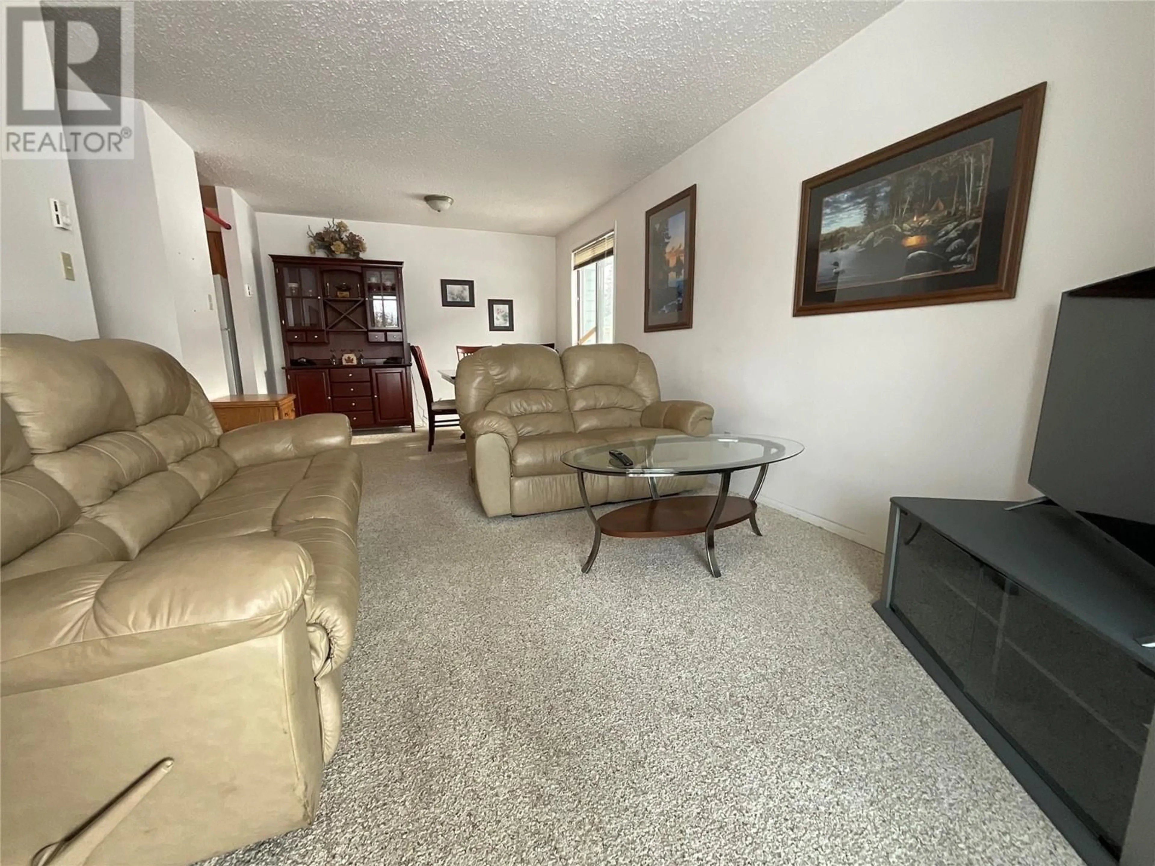 Living room with furniture, unknown for 104 - 216 SPIEKER AVENUE, Tumbler Ridge British Columbia V0C2W0