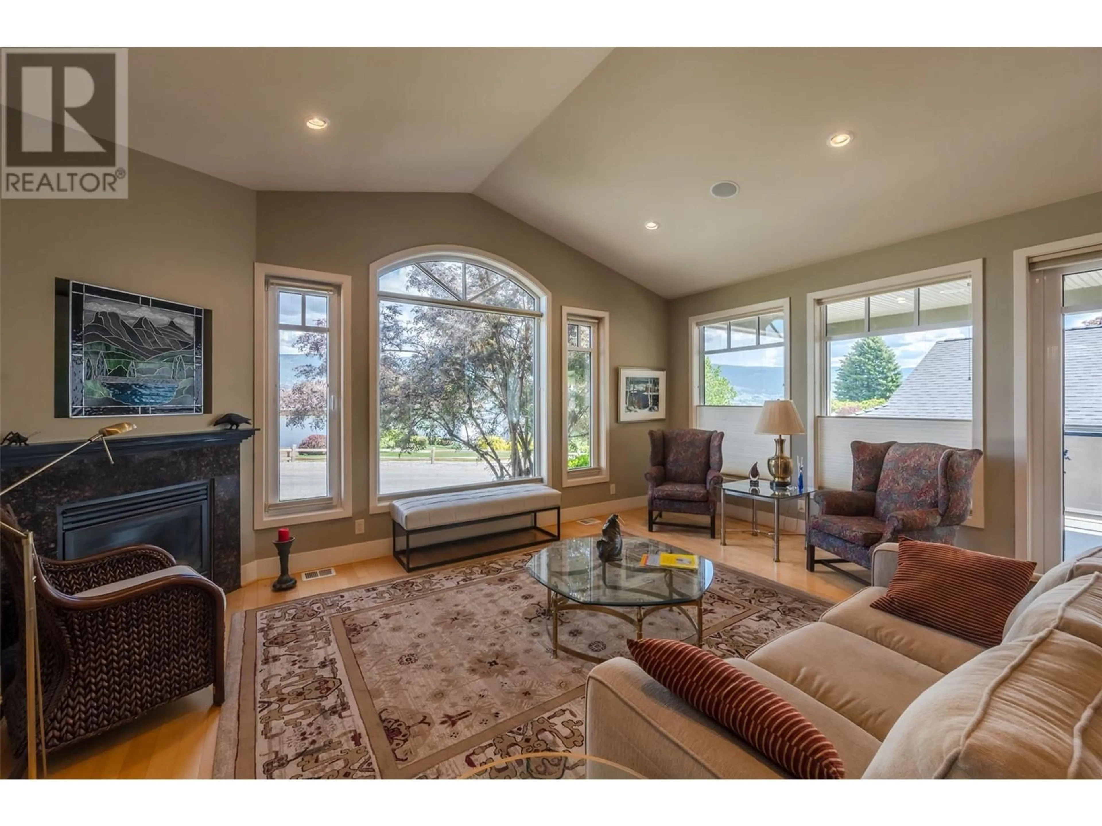 Living room with furniture, wood/laminate floor for 11404 WALTERS ROAD, Summerland British Columbia V0H1Z4