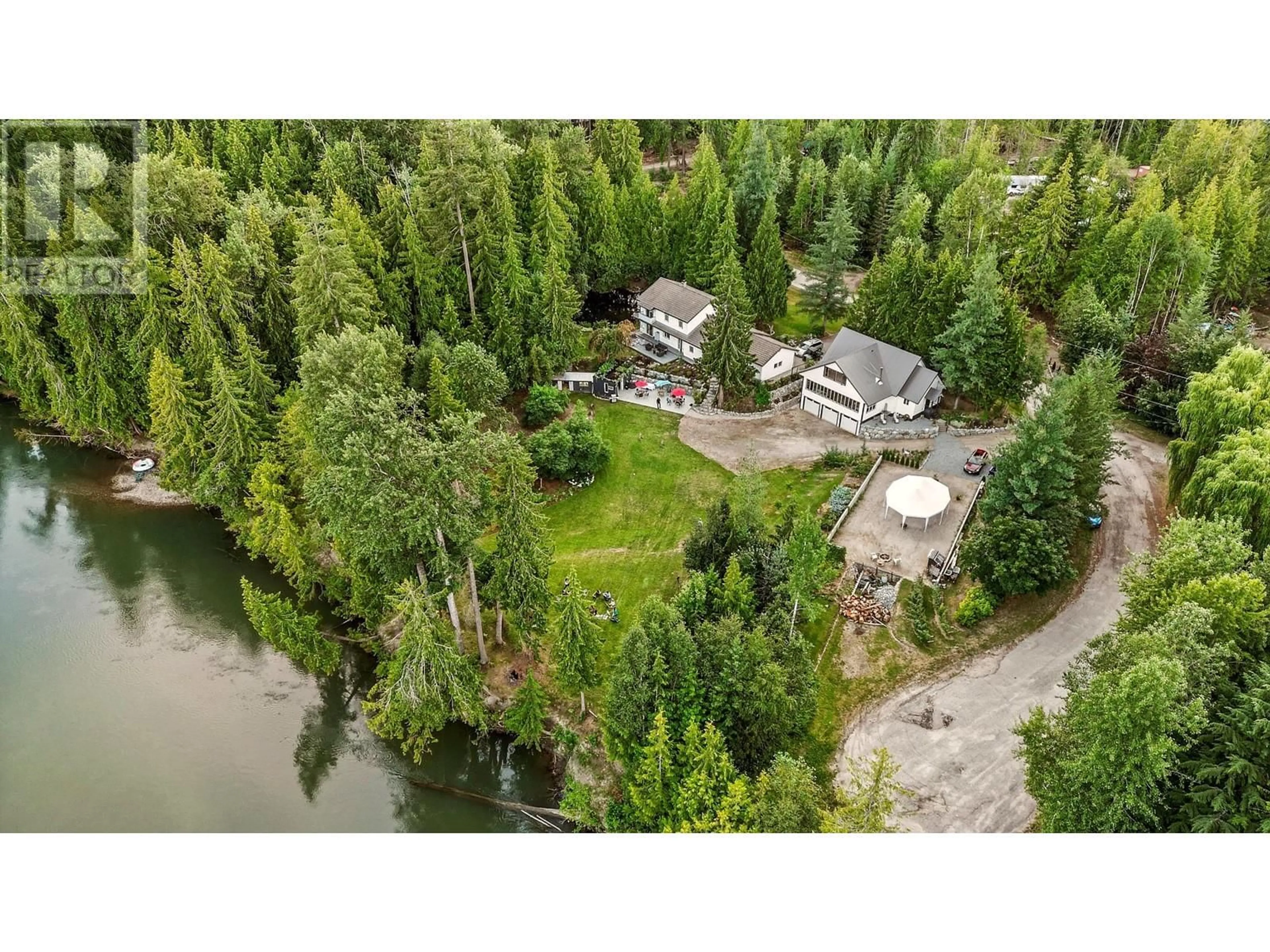 A pic from outside/outdoor area/front of a property/back of a property/a pic from drone, water/lake/river/ocean view for 2012 BUNDUS ROAD, Sicamous British Columbia V0E2V4