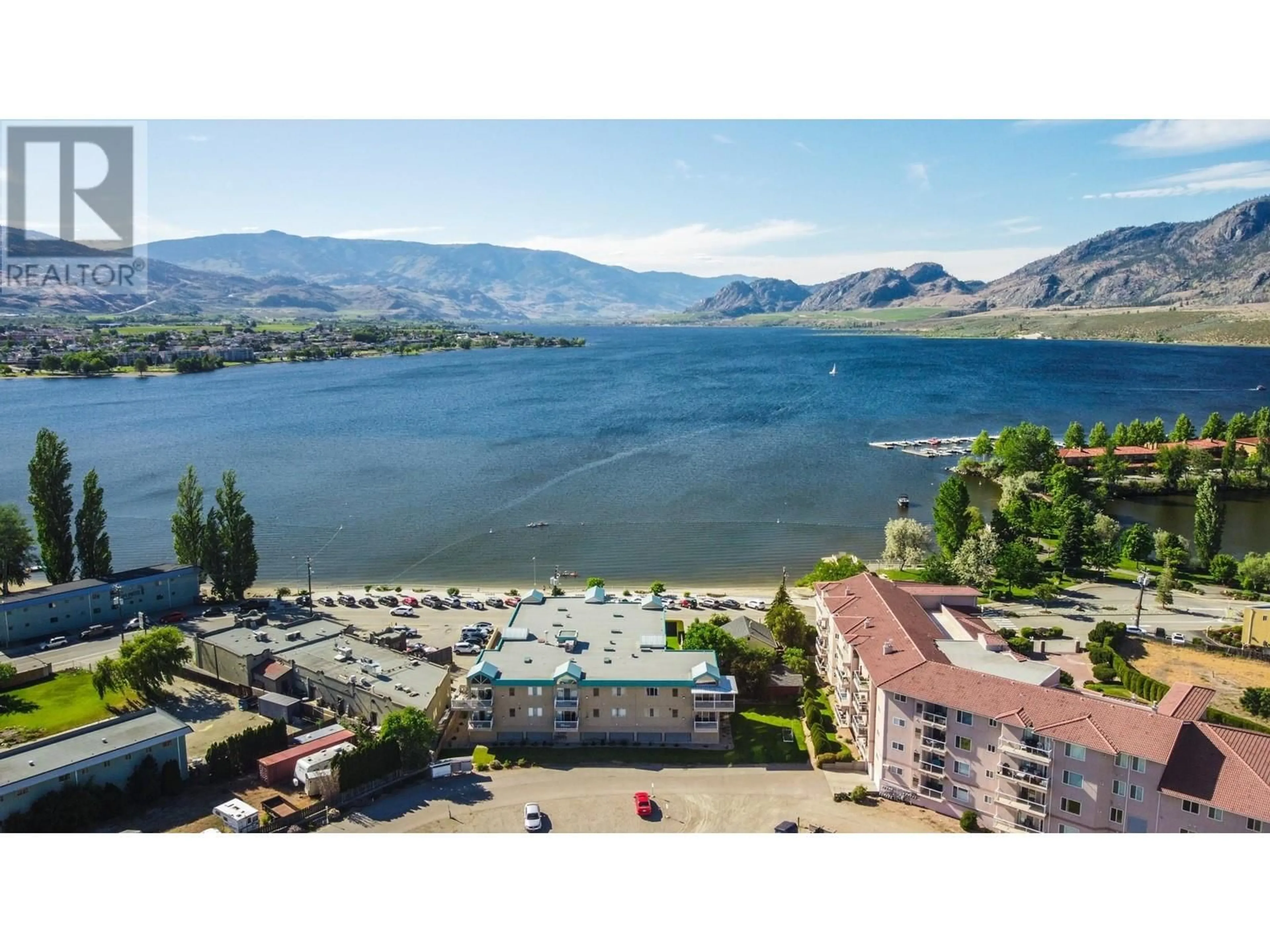 A pic from outside/outdoor area/front of a property/back of a property/a pic from drone, water/lake/river/ocean view for 8 - 6801 COTTONWOOD DRIVE, Osoyoos British Columbia V0H1V3