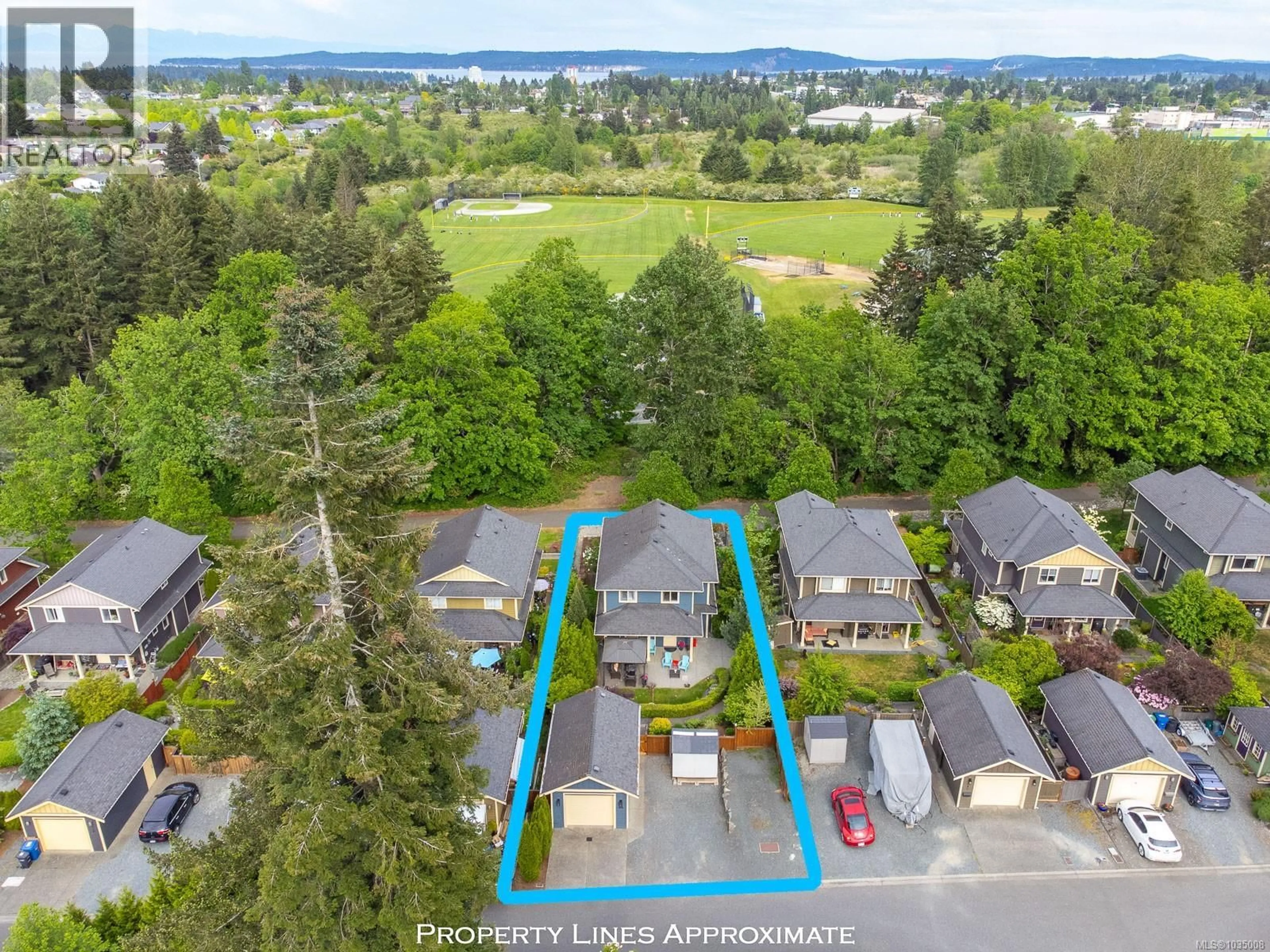 A pic from outside/outdoor area/front of a property/back of a property/a pic from drone, water/lake/river/ocean view for 336 WESSEX LANE, Nanaimo British Columbia V9R6H5