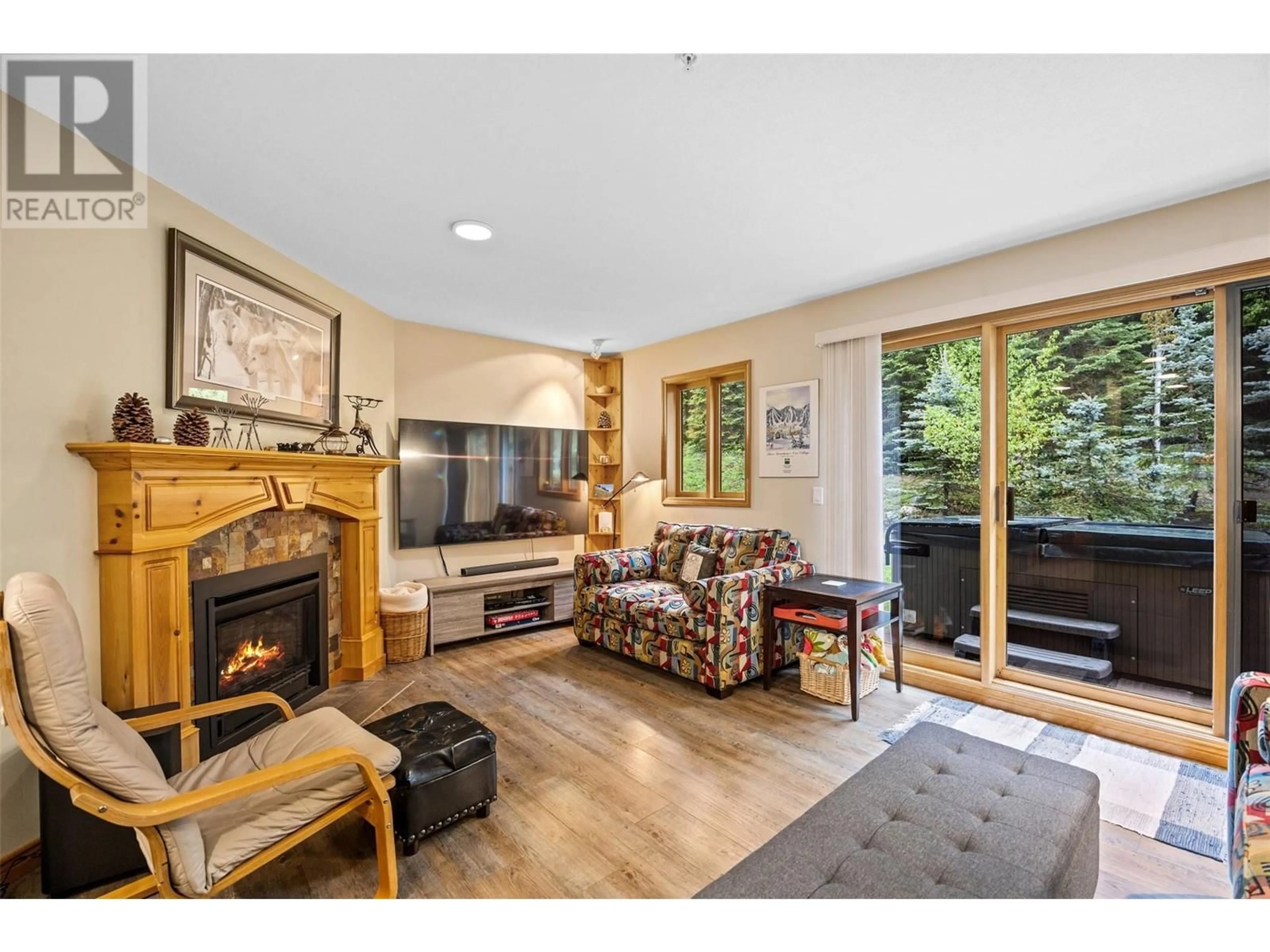 Living room with furniture, wood/laminate floor for 31 - 3320 VILLAGE PLACE, Sun Peaks British Columbia V0E5N0