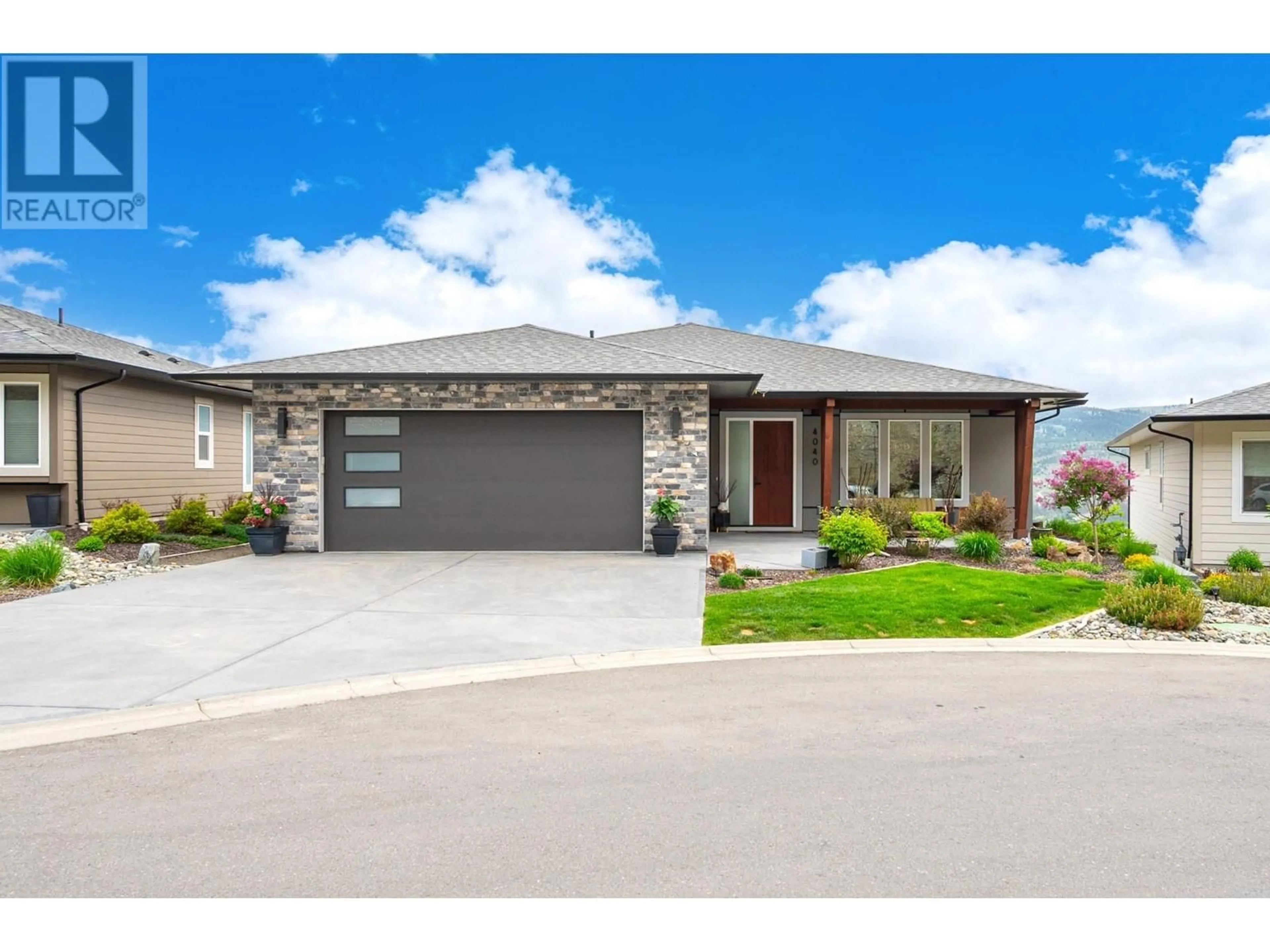 Home with brick exterior material, street for 4040 RIO VISTA WAY, Kamloops British Columbia V2H0E1
