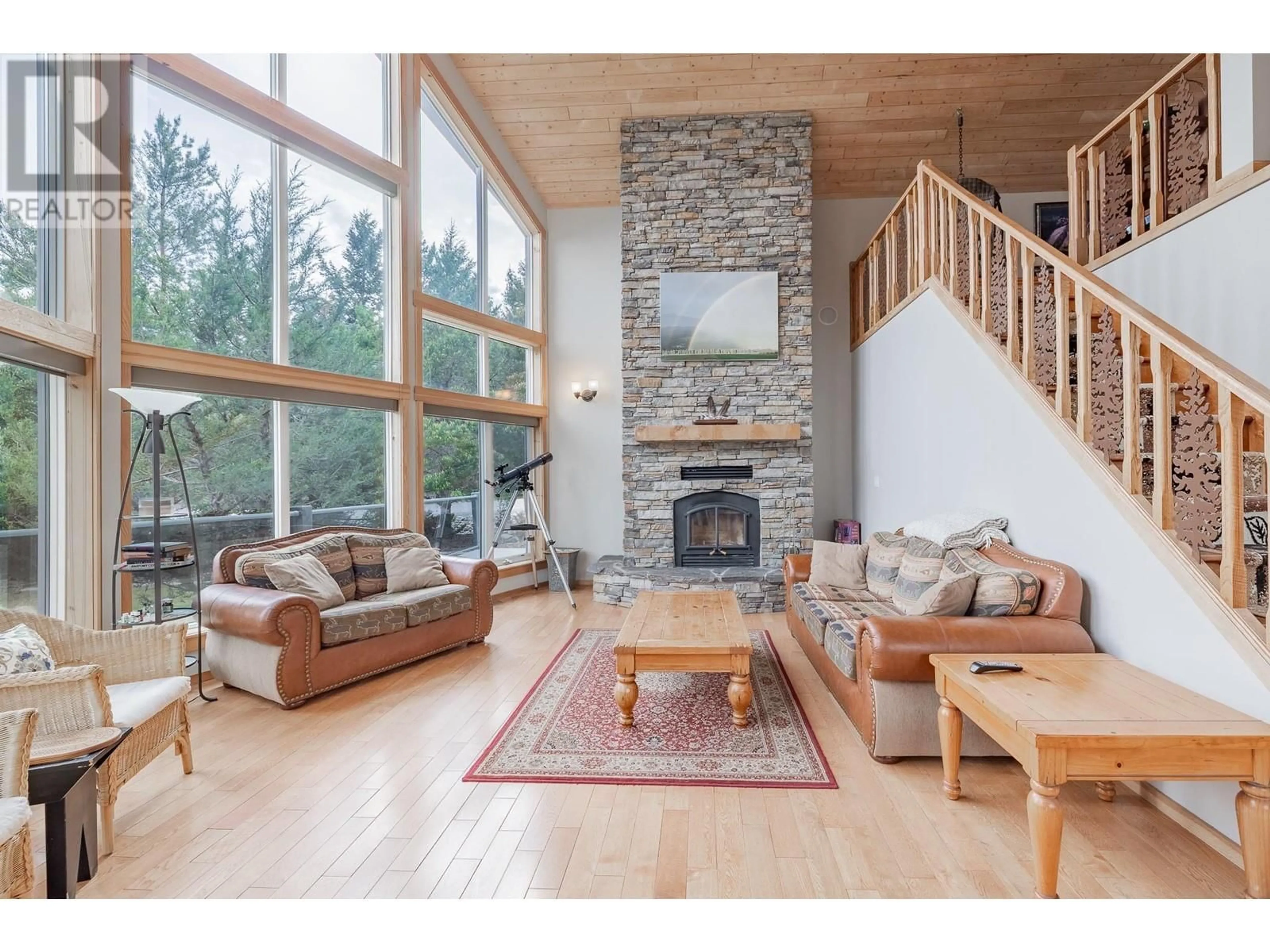 Living room with furniture, wood/laminate floor for 4563 COLUMBIA VIEW ROAD, Fairmont Hot Springs British Columbia V0B1L2