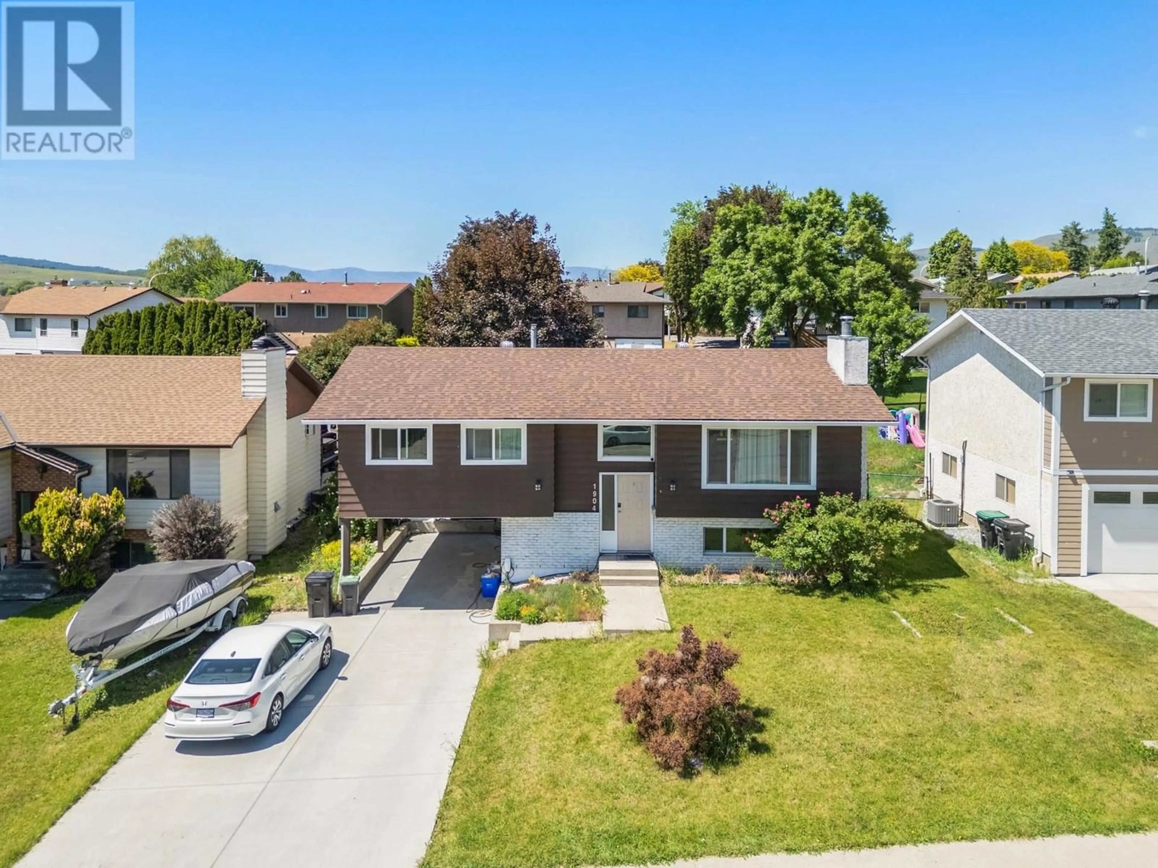 A pic from outside/outdoor area/front of a property/back of a property/a pic from drone, street for 1904 18 STREET, Vernon British Columbia V1T8G2