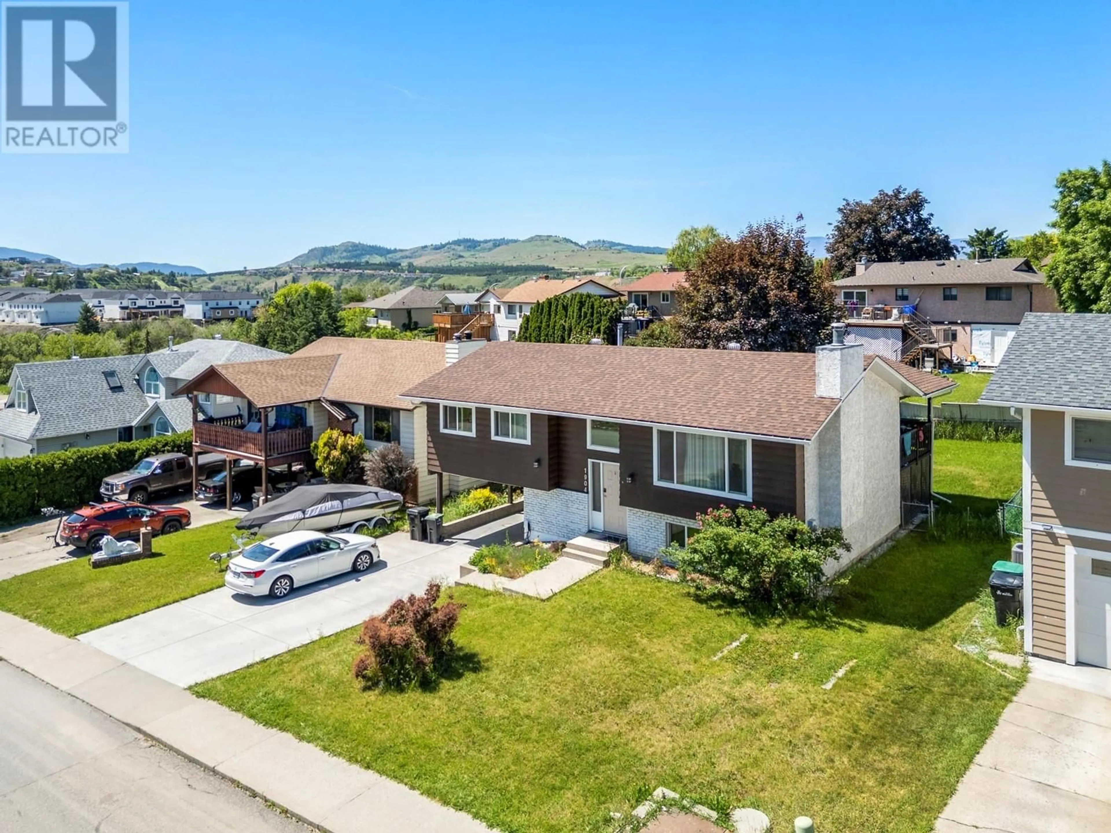 A pic from outside/outdoor area/front of a property/back of a property/a pic from drone, mountain view for 1904 18 STREET, Vernon British Columbia V1T8G2