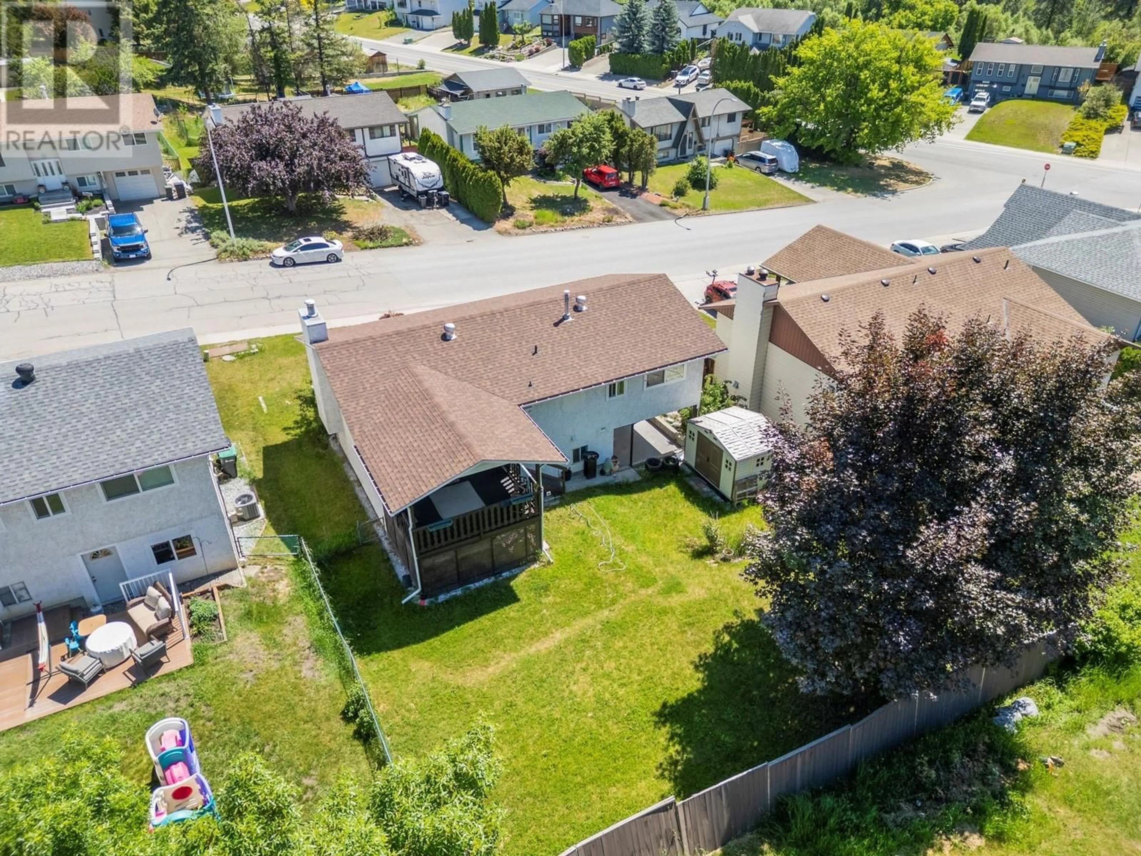 A pic from outside/outdoor area/front of a property/back of a property/a pic from drone, street for 1904 18 STREET, Vernon British Columbia V1T8G2