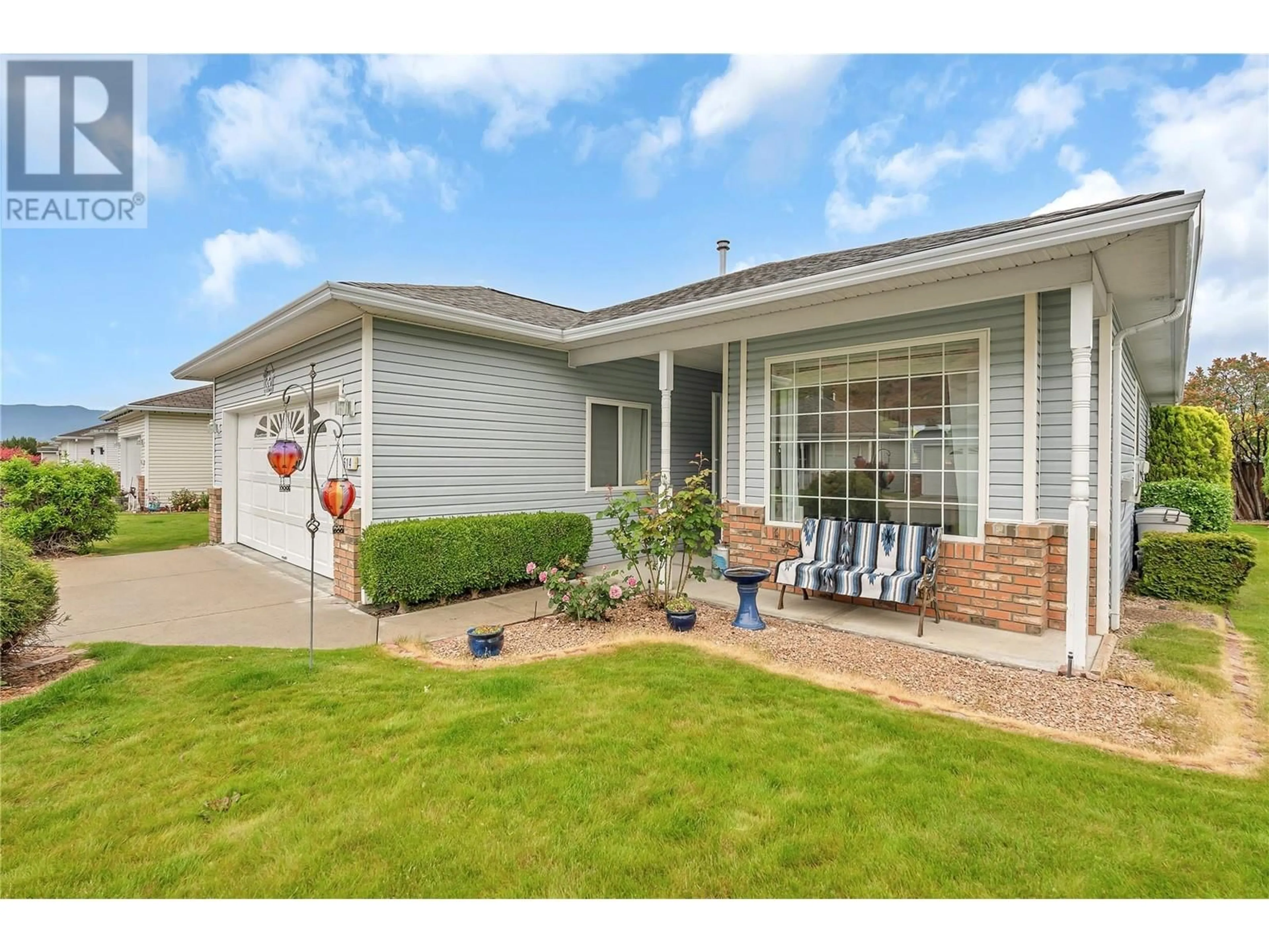Home with vinyl exterior material, street for 514 RED WING DRIVE, Penticton British Columbia V2A8N7