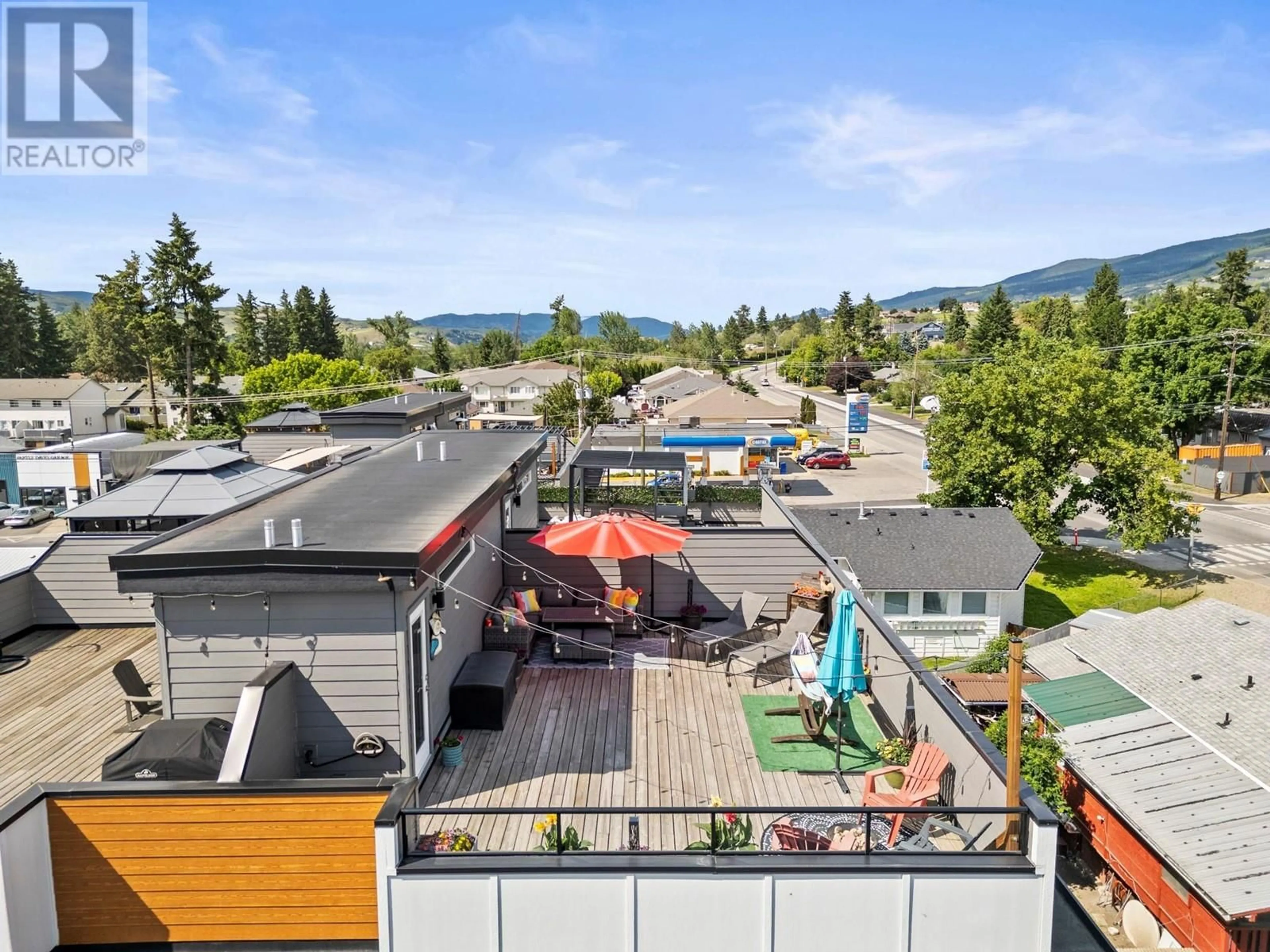 A pic from outside/outdoor area/front of a property/back of a property/a pic from drone, mountain view for 4 - 1805 45 AVENUE, Vernon British Columbia V1T7T7
