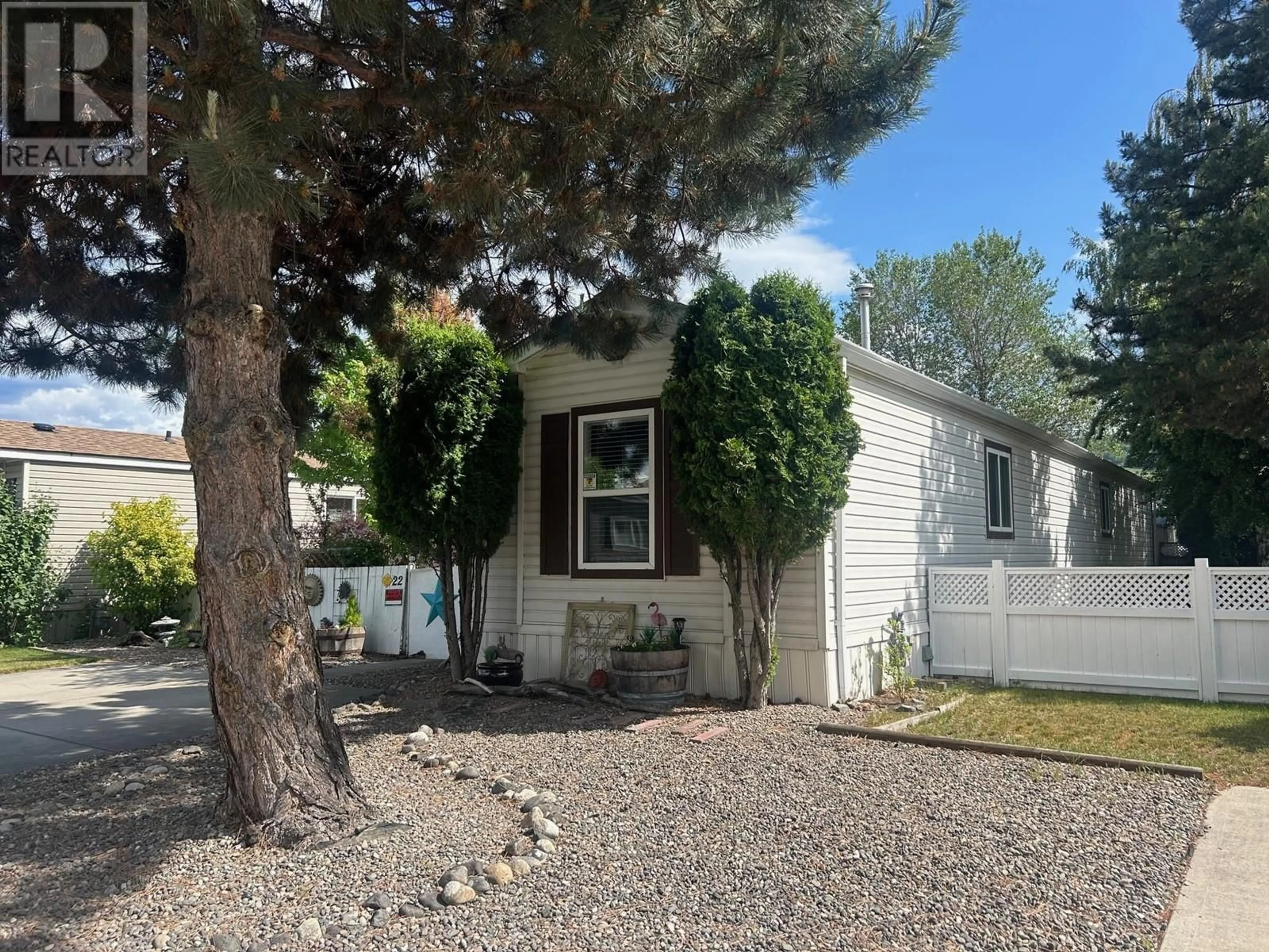 Home with vinyl exterior material, street for 22 - 6688 TRONSON ROAD, Vernon British Columbia V1H1R9