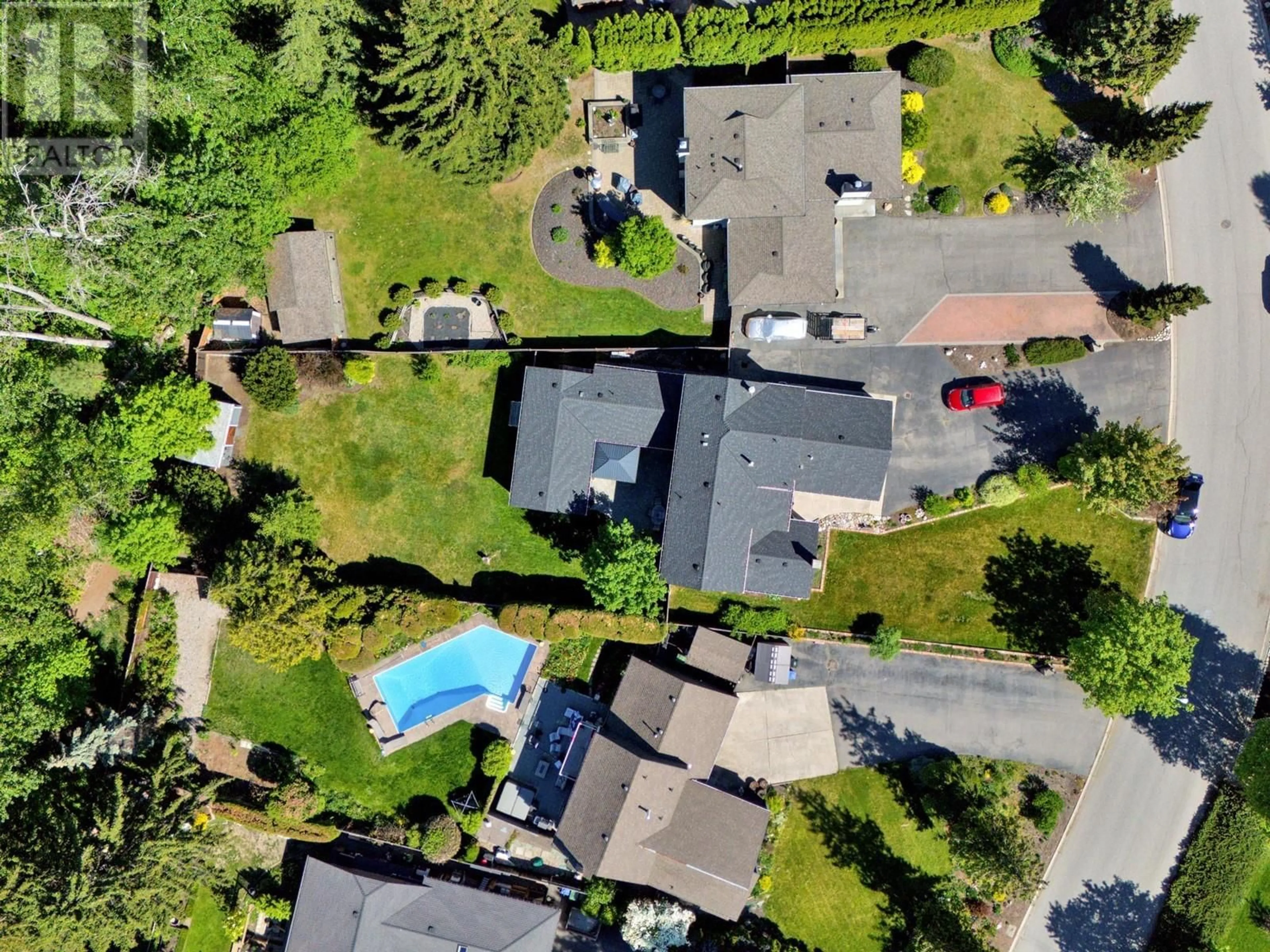 A pic from outside/outdoor area/front of a property/back of a property/a pic from drone, street for 684 THORNELOE ROAD, Kelowna British Columbia V1W4P6