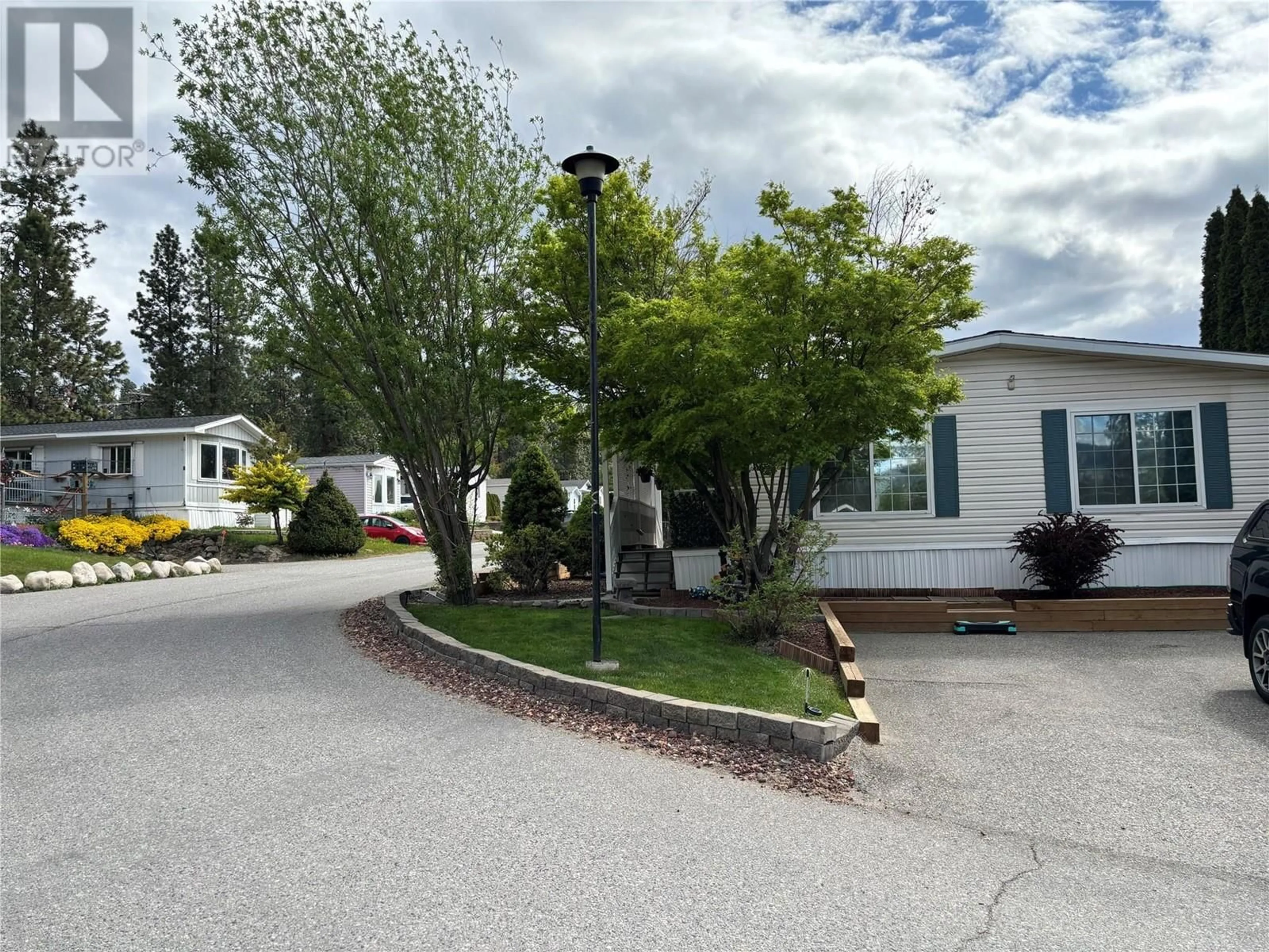 A pic from outside/outdoor area/front of a property/back of a property/a pic from drone, street for 50 - 3225 SHANNON LAKE ROAD, Westbank British Columbia V4T2E2