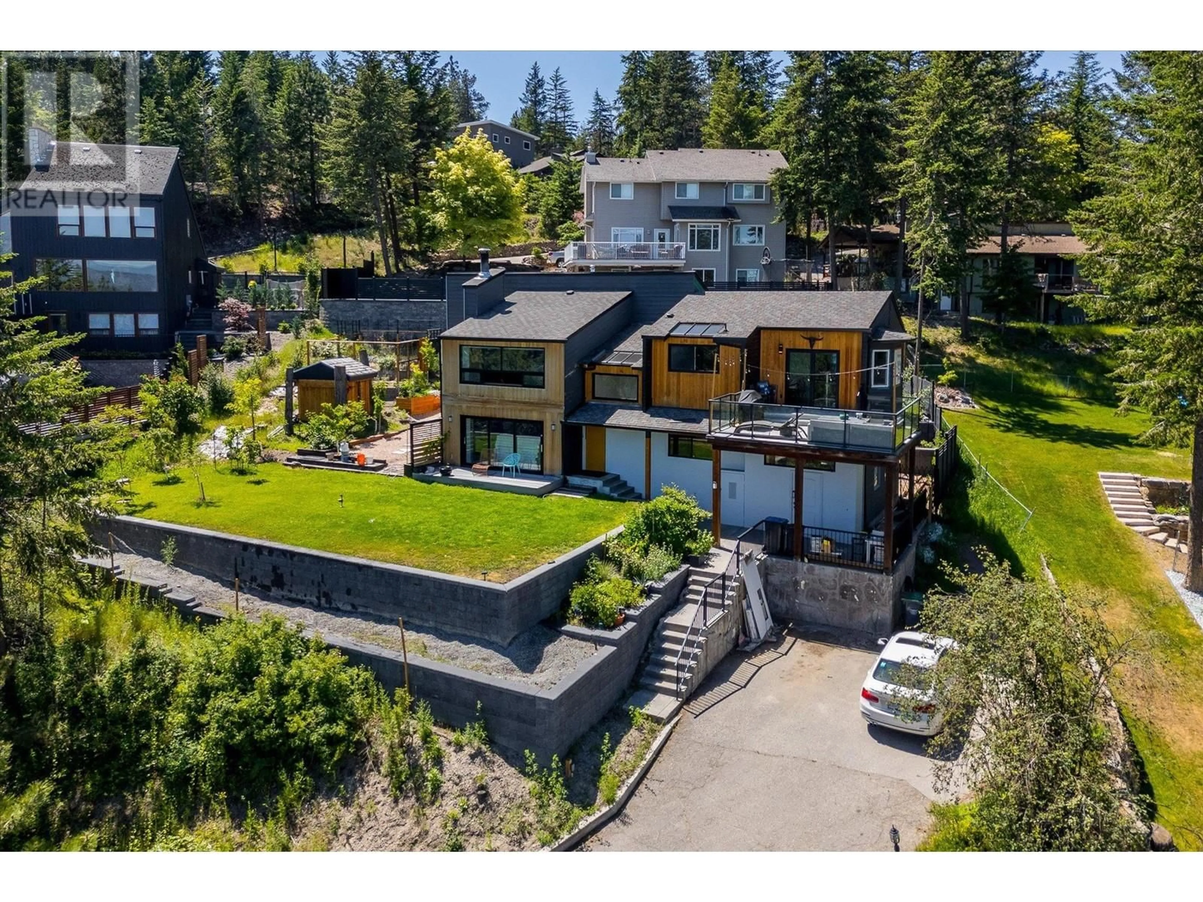 A pic from outside/outdoor area/front of a property/back of a property/a pic from drone, mountain view for 1632 GRIFFITHS PLACE, West Kelowna British Columbia V1Z2T7