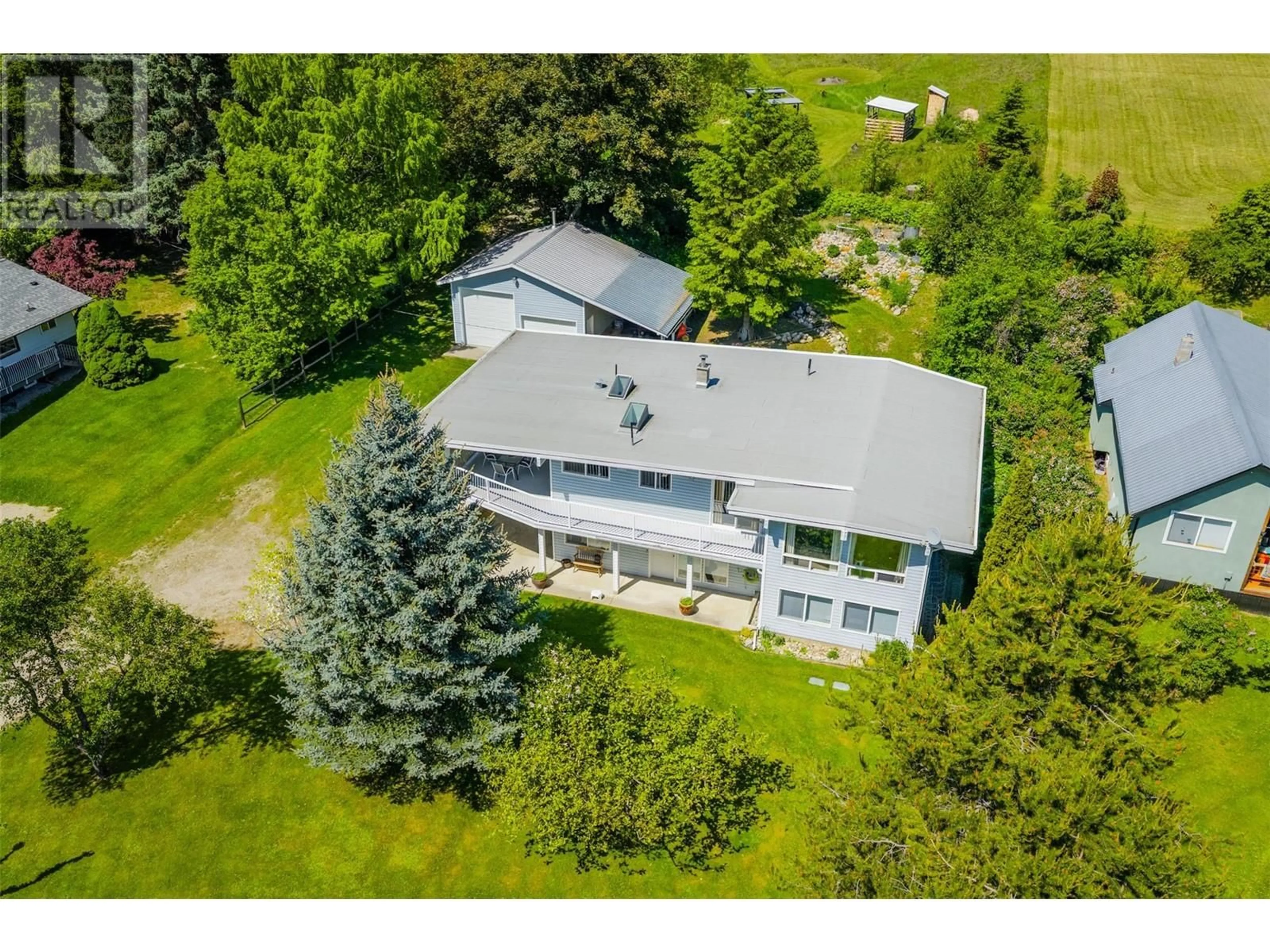 A pic from outside/outdoor area/front of a property/back of a property/a pic from drone, building for 1621 HIGHWAY 3A HIGHWAY, Castlegar British Columbia V1N4N3