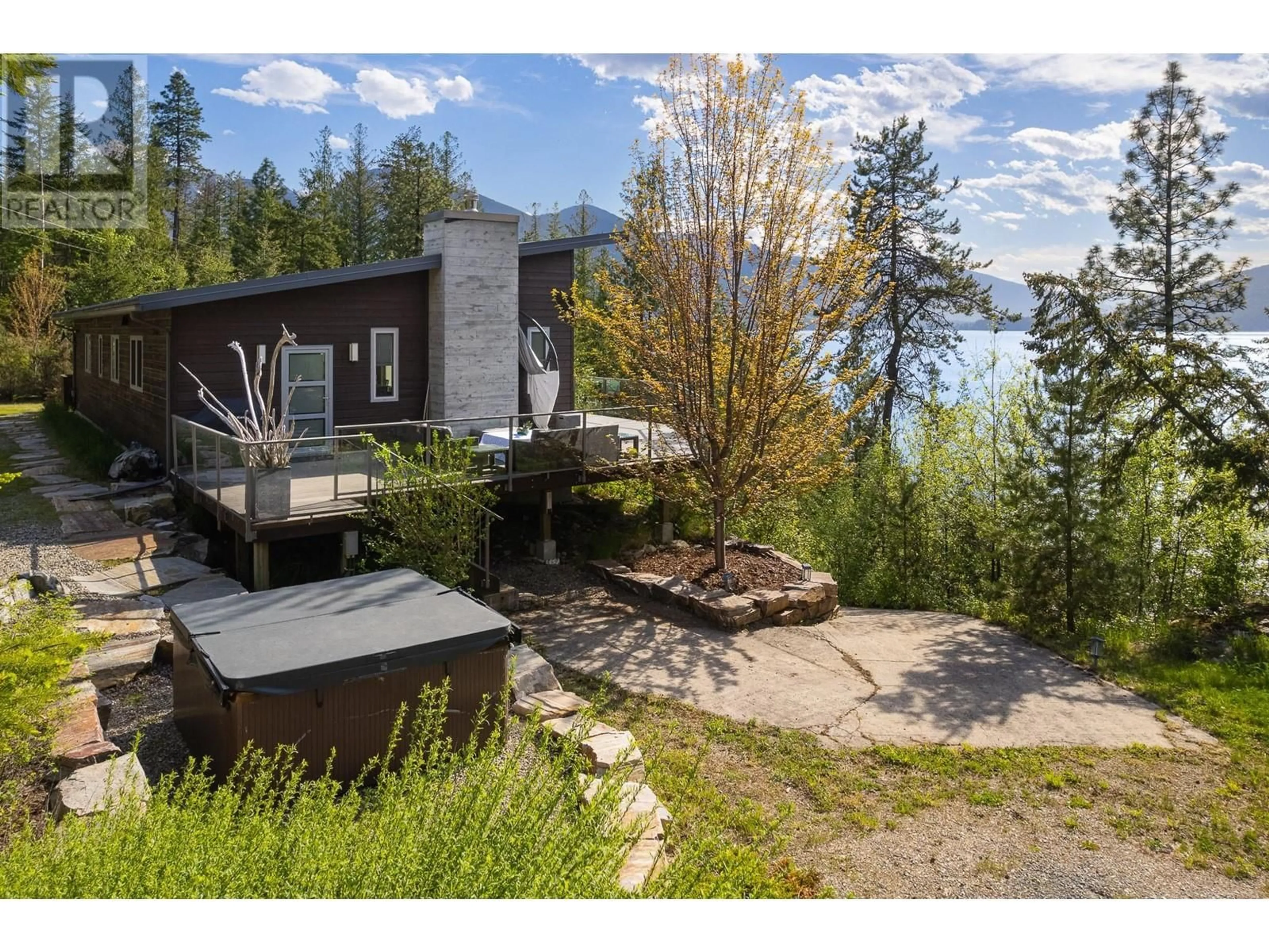A pic from outside/outdoor area/front of a property/back of a property/a pic from drone, water/lake/river/ocean view for 17246 PILOT BAY ROAD, Crawford Bay British Columbia V0B1X0