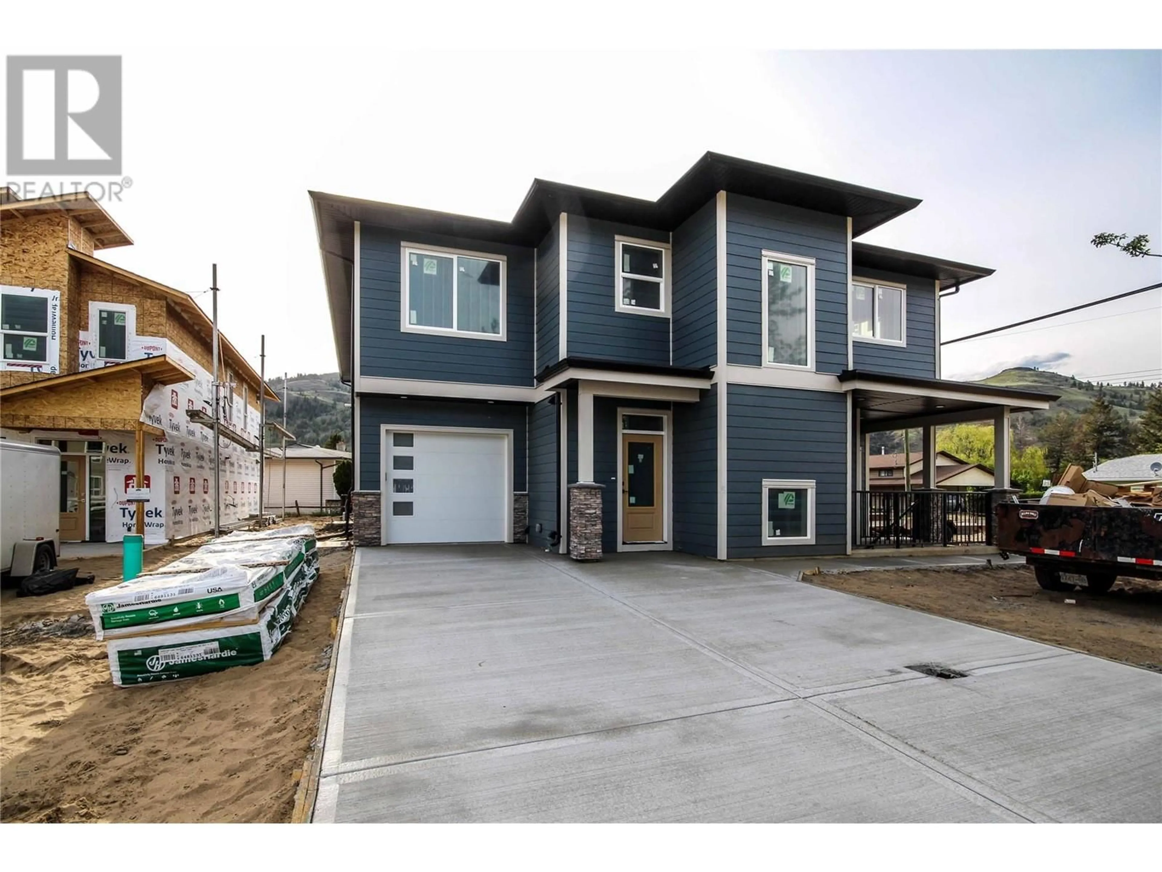 Home with vinyl exterior material, street for 3228 BANK ROAD, Kamloops British Columbia V2B6Z7