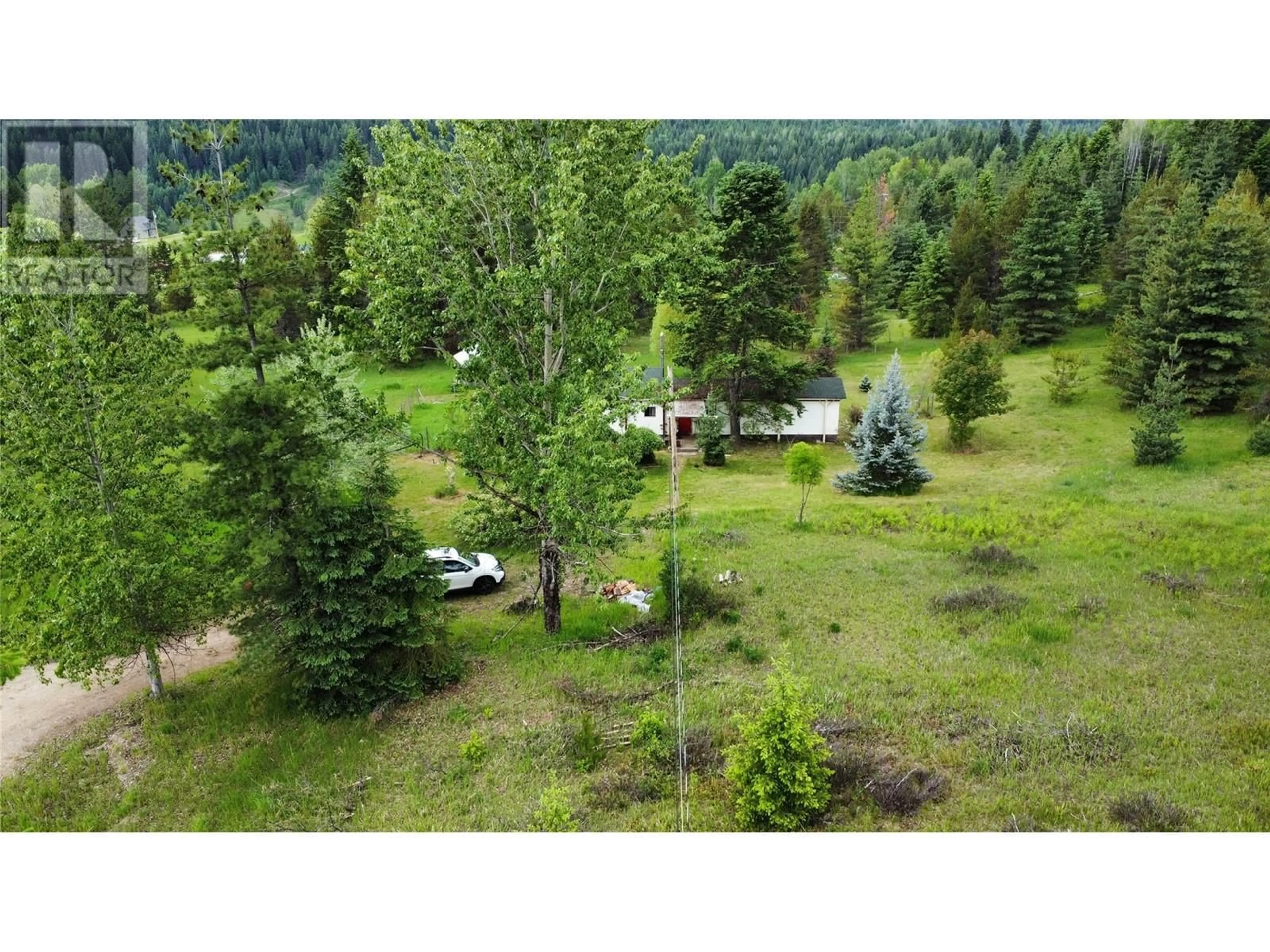 A pic from outside/outdoor area/front of a property/back of a property/a pic from drone, forest/trees view for 3688 MCKENZIE ROAD, Krestova British Columbia V0G1H2