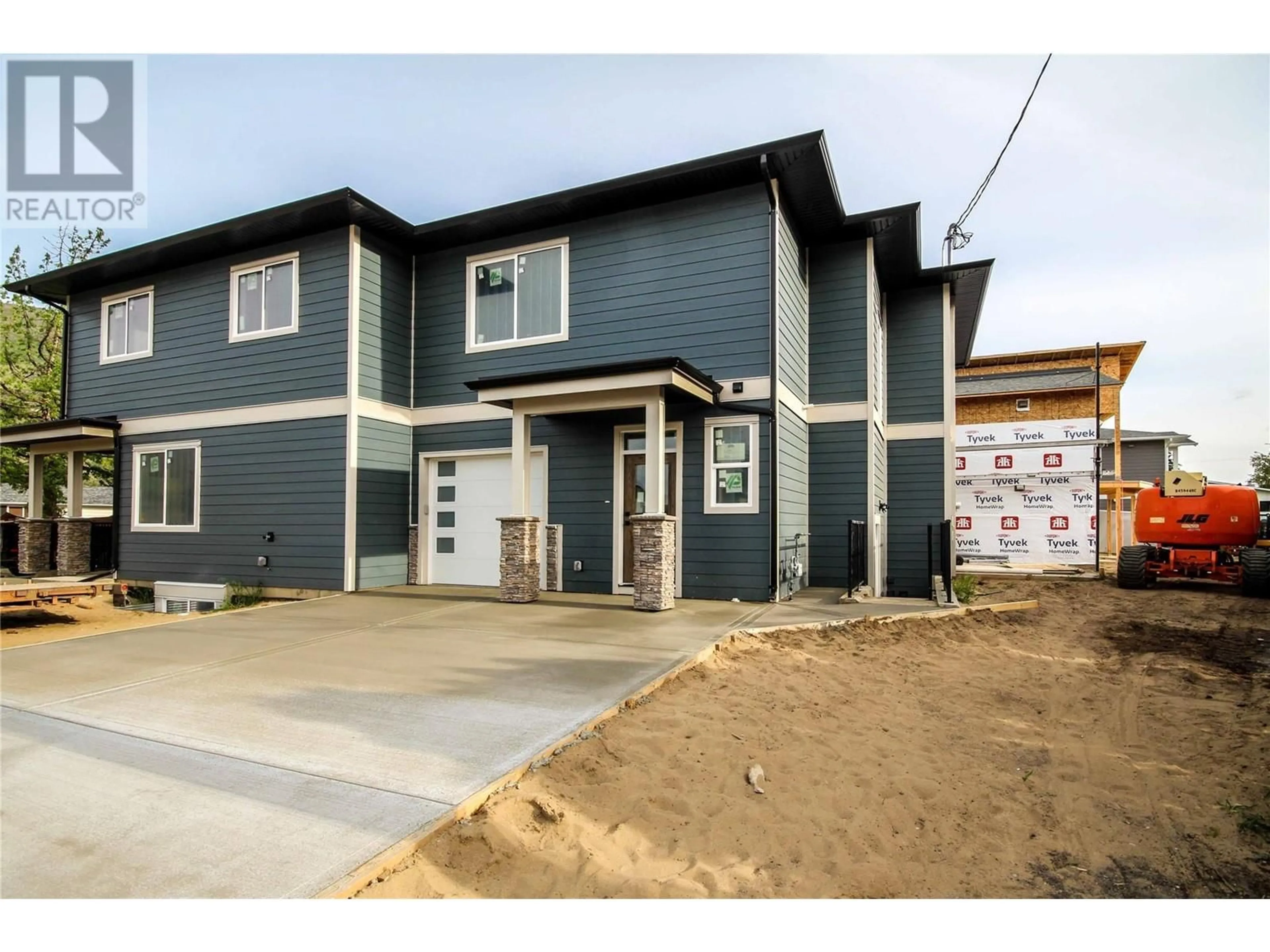 Home with vinyl exterior material, street for 723 LYNE ROAD, Kamloops British Columbia V2B6Z7