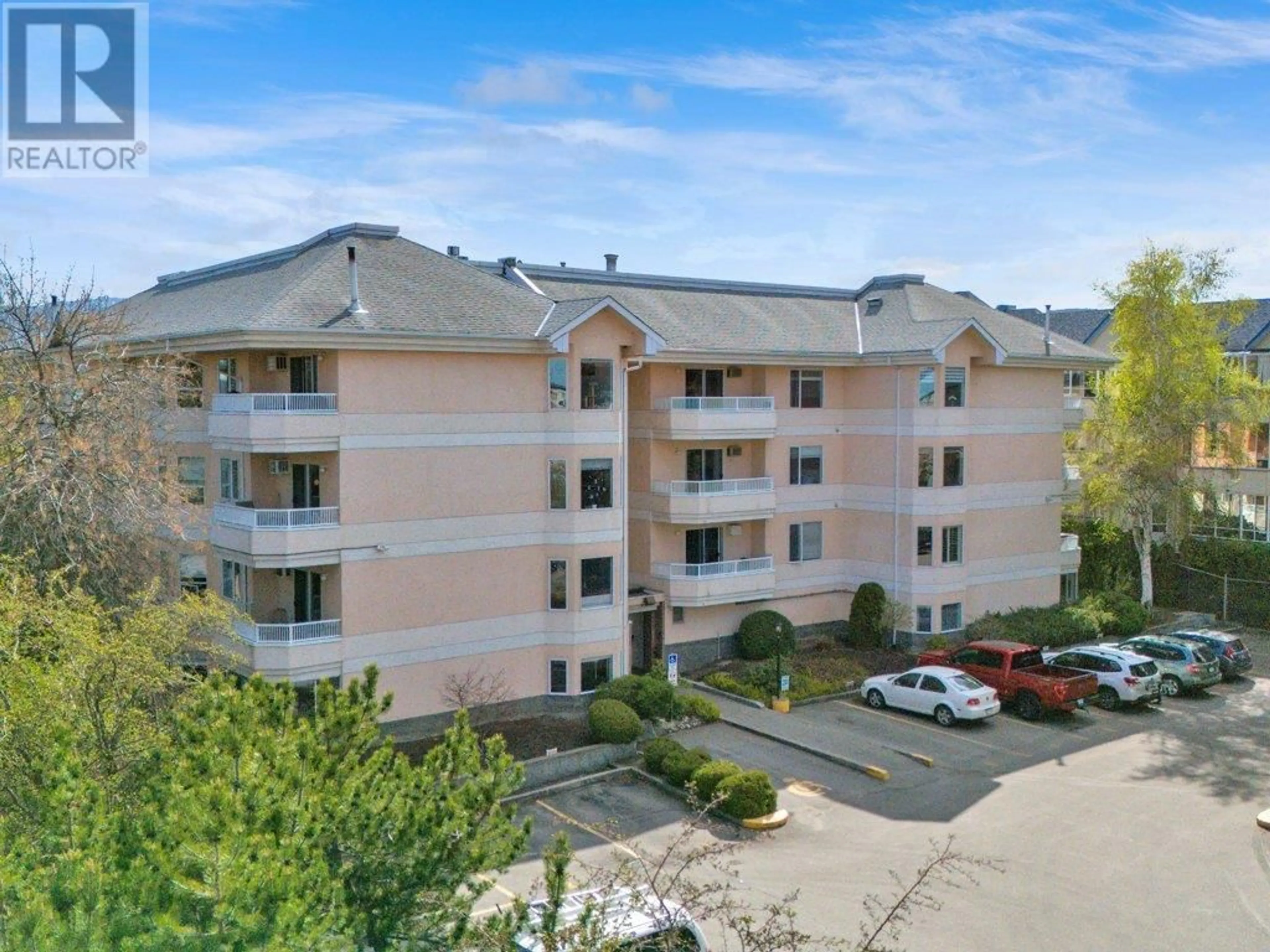 A pic from outside/outdoor area/front of a property/back of a property/a pic from drone, unknown for 306 - 987 KLO ROAD, Kelowna British Columbia V1Y9L2