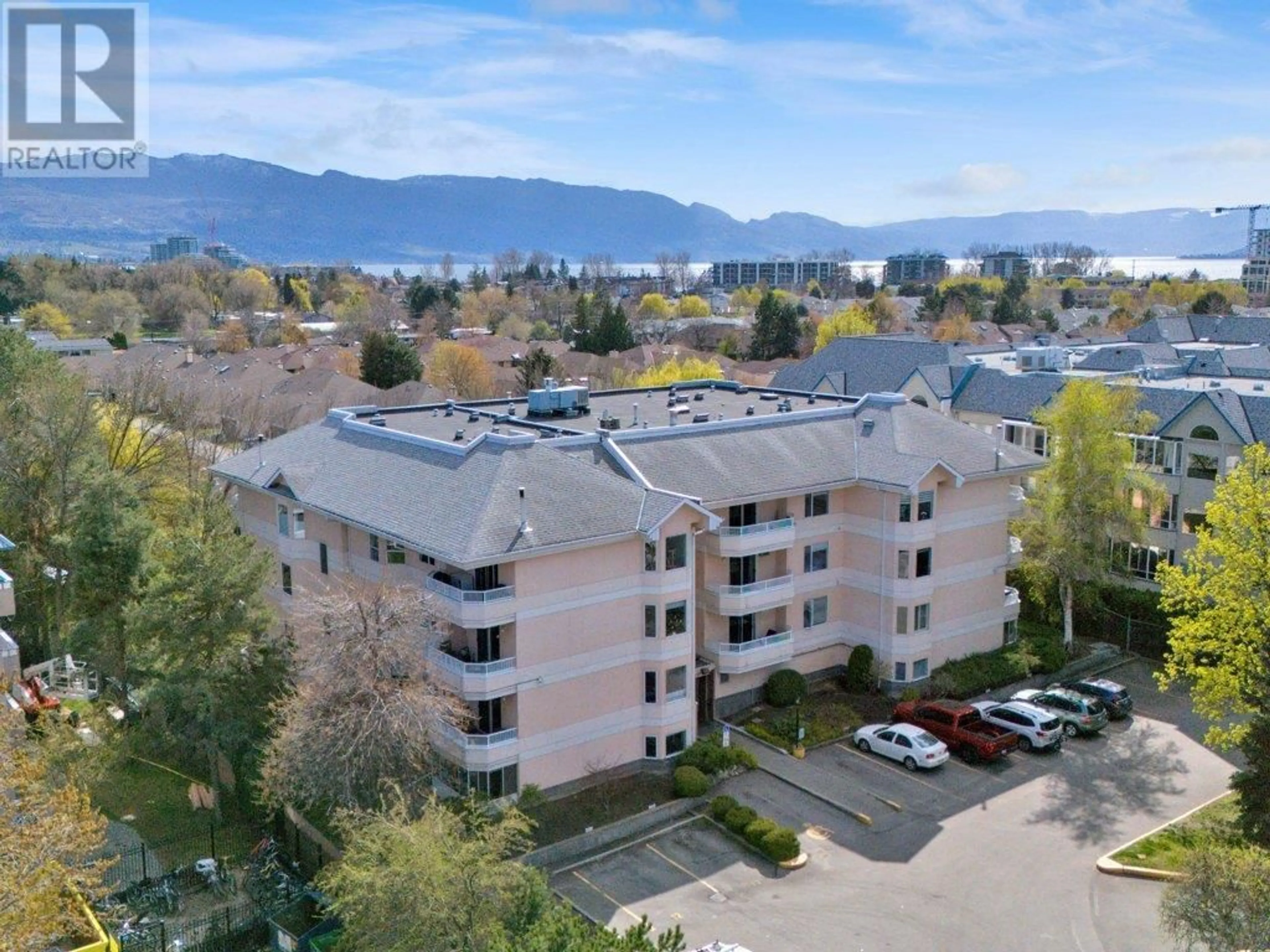 A pic from outside/outdoor area/front of a property/back of a property/a pic from drone, mountain view for 306 - 987 KLO ROAD, Kelowna British Columbia V1Y9L2