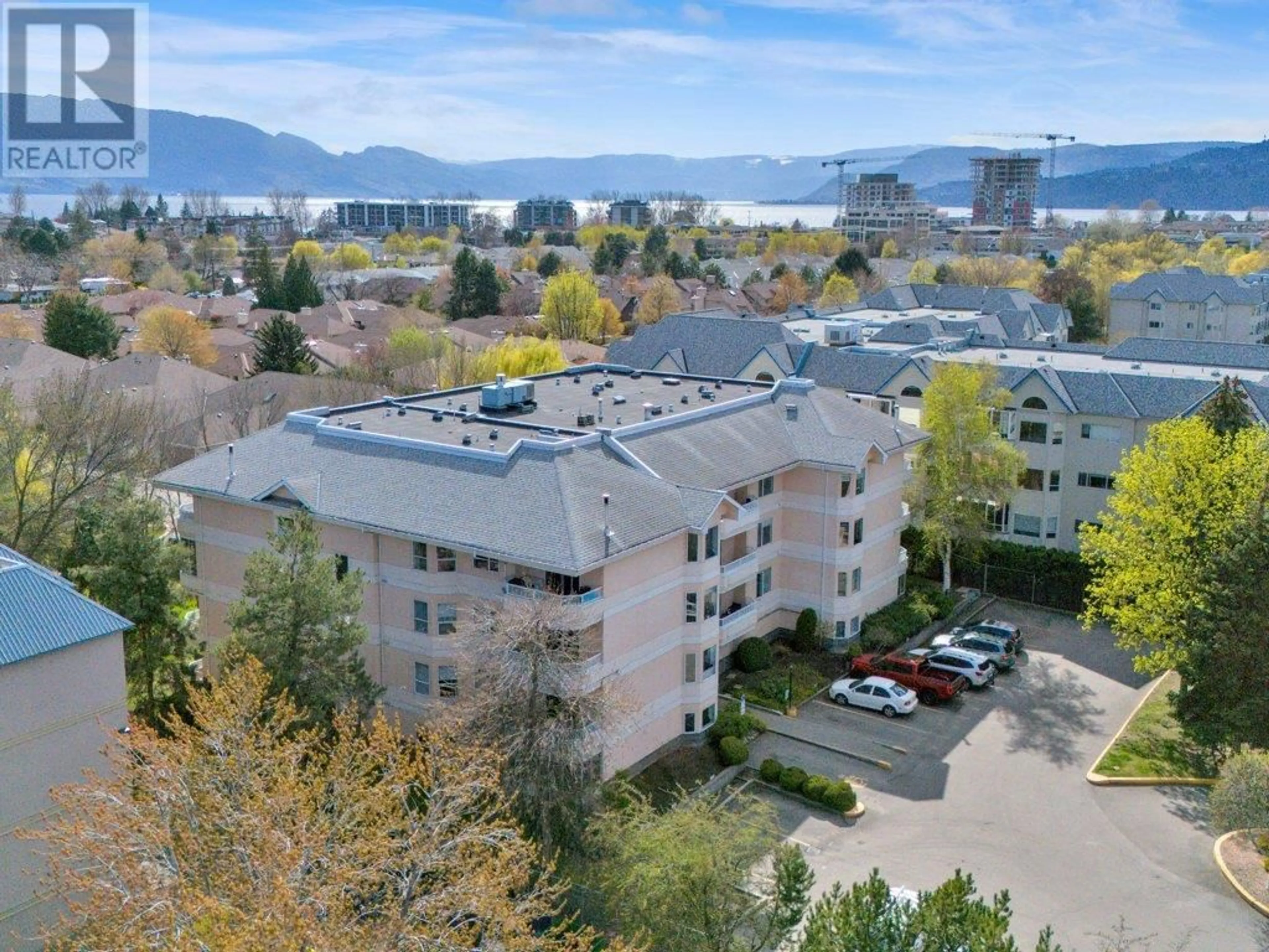 A pic from outside/outdoor area/front of a property/back of a property/a pic from drone, mountain view for 306 - 987 KLO ROAD, Kelowna British Columbia V1Y9L2