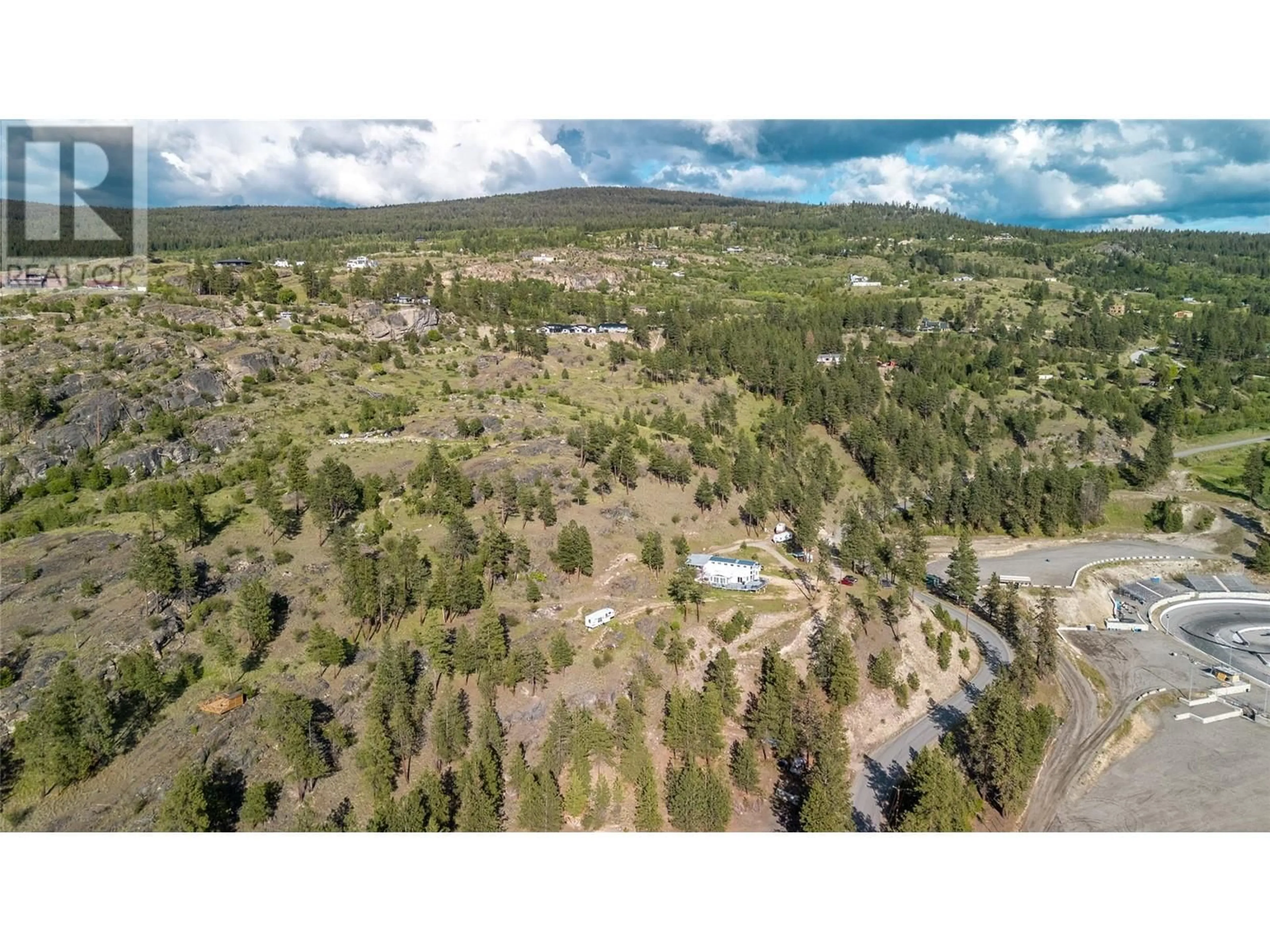 A pic from outside/outdoor area/front of a property/back of a property/a pic from drone, forest/trees view for 2081 CARMI ROAD, Penticton British Columbia V2A8C5