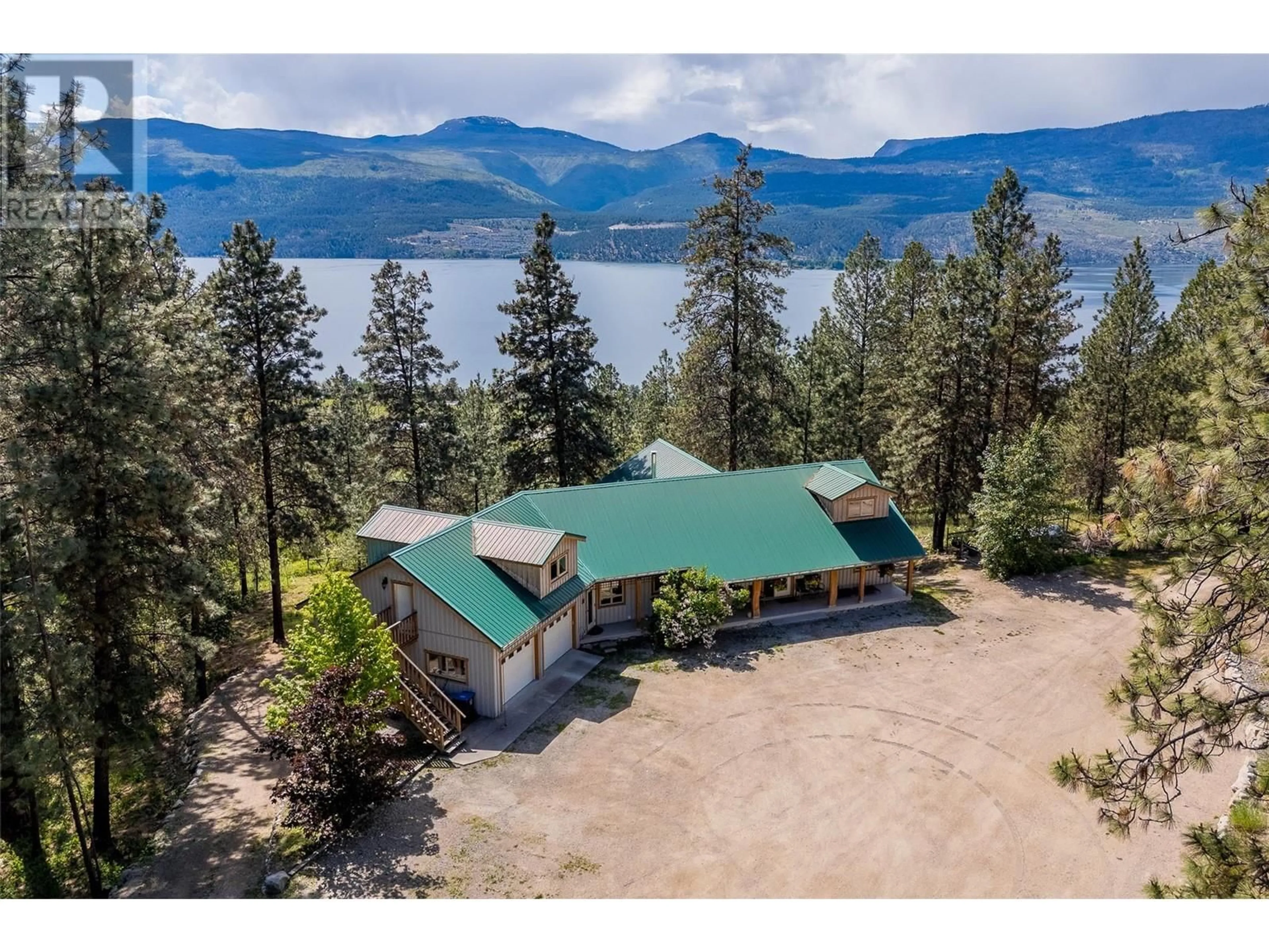A pic from outside/outdoor area/front of a property/back of a property/a pic from drone, water/lake/river/ocean view for 17142 COMMONAGE ROAD, Lake Country British Columbia V4V1B5