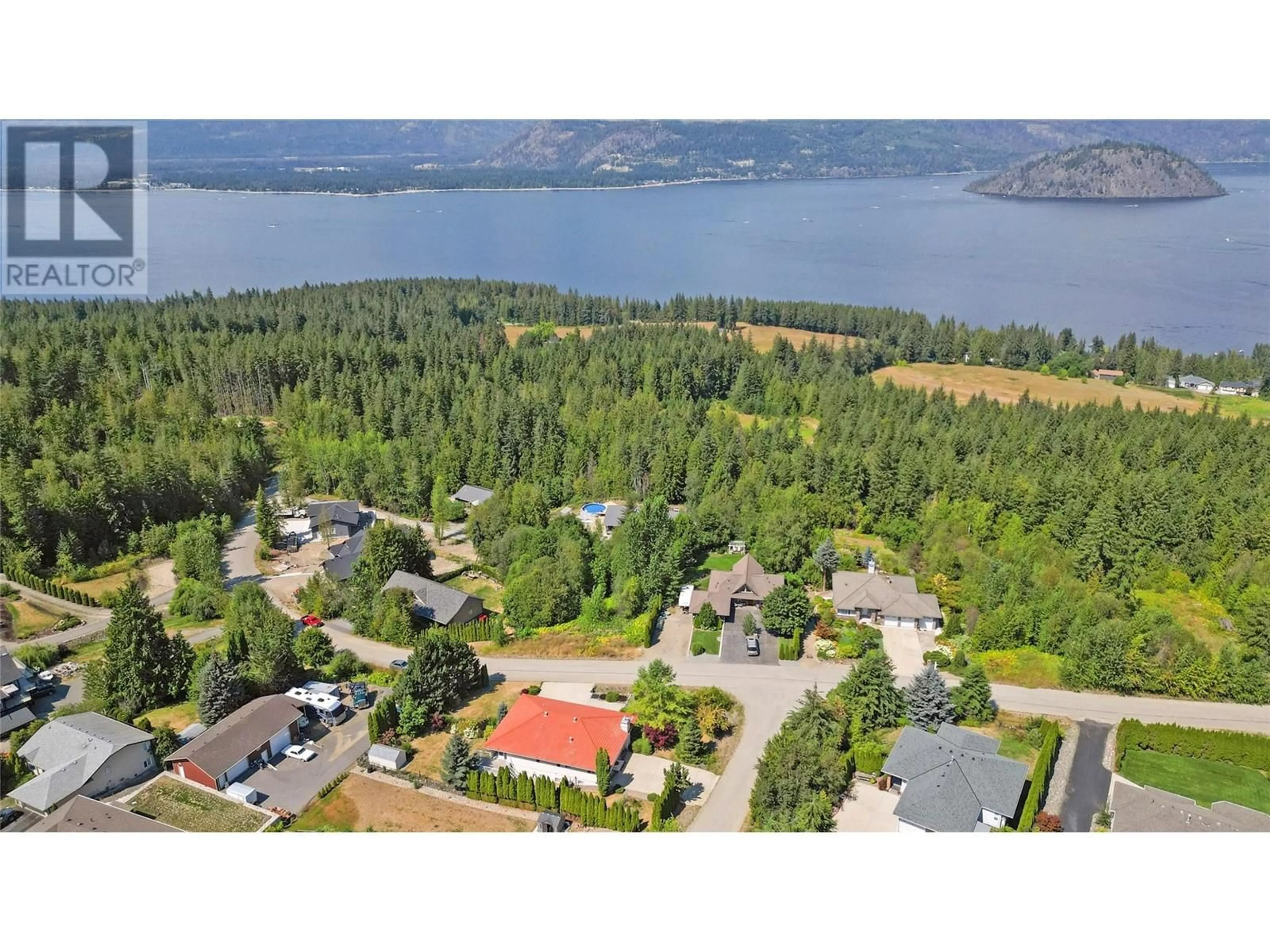 A pic from outside/outdoor area/front of a property/back of a property/a pic from drone, water/lake/river/ocean view for 2143 PLEASANT DALE ROAD, Blind Bay British Columbia V0E2W1