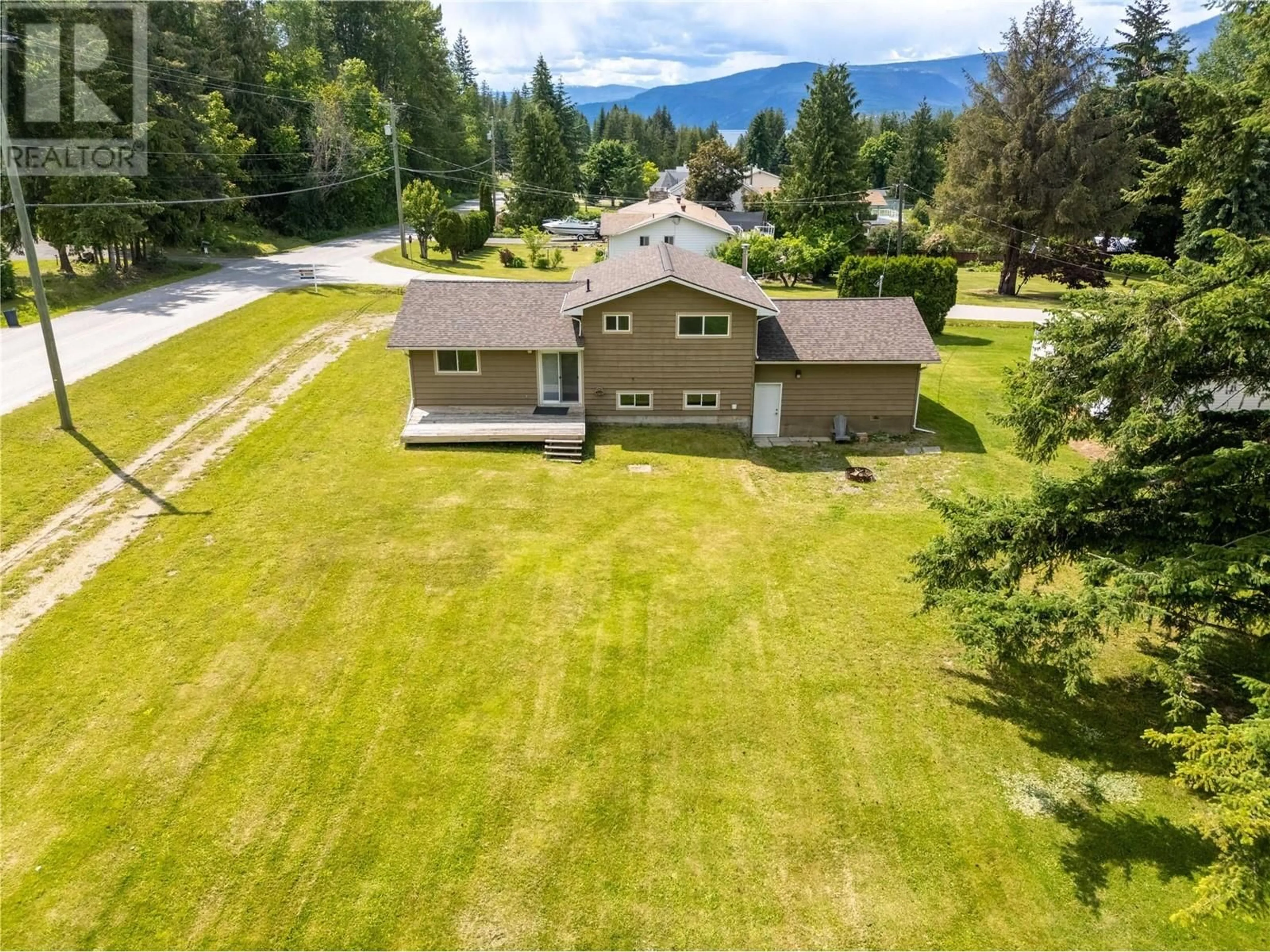 A pic from outside/outdoor area/front of a property/back of a property/a pic from drone, unknown for 4002 TORRY ROAD, Eagle Bay British Columbia V0E1T0