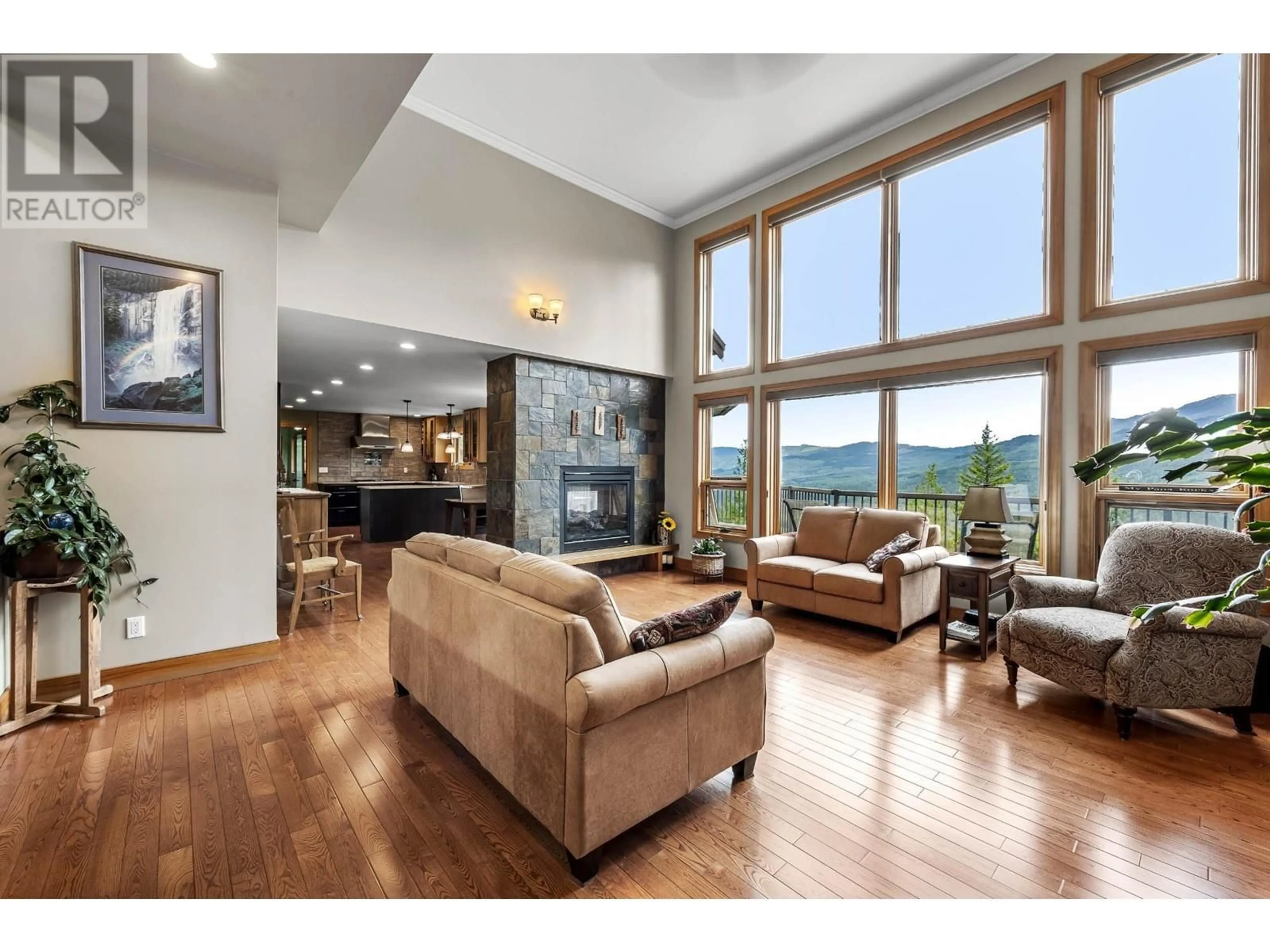 Living room with furniture, wood/laminate floor for 1249 CLEARWATER VALLEY ROAD, Clearwater British Columbia V0E1N1