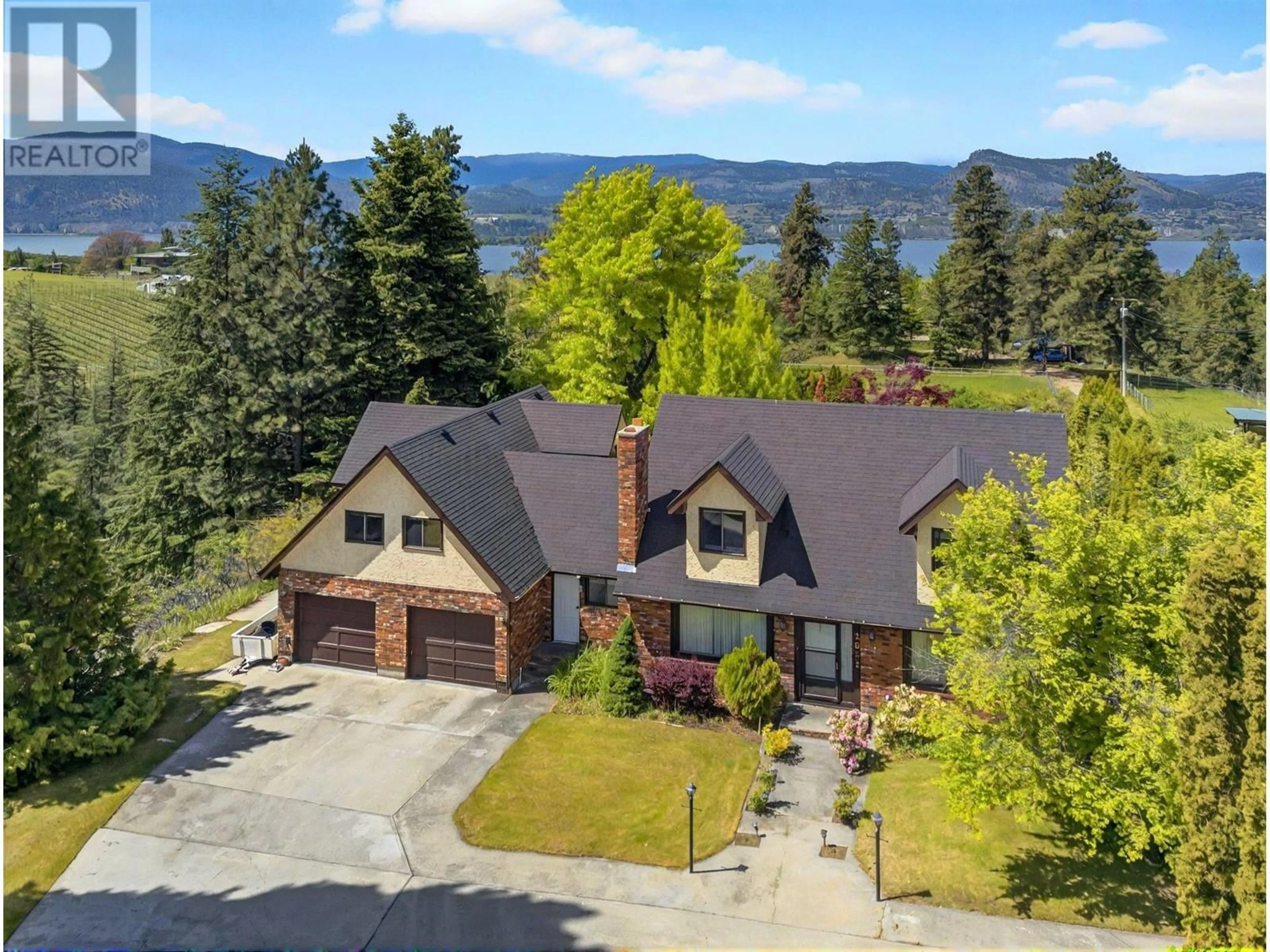 A pic from outside/outdoor area/front of a property/back of a property/a pic from drone, water/lake/river/ocean view for 3025 NARAMATA ROAD, Naramata British Columbia V0H1N1