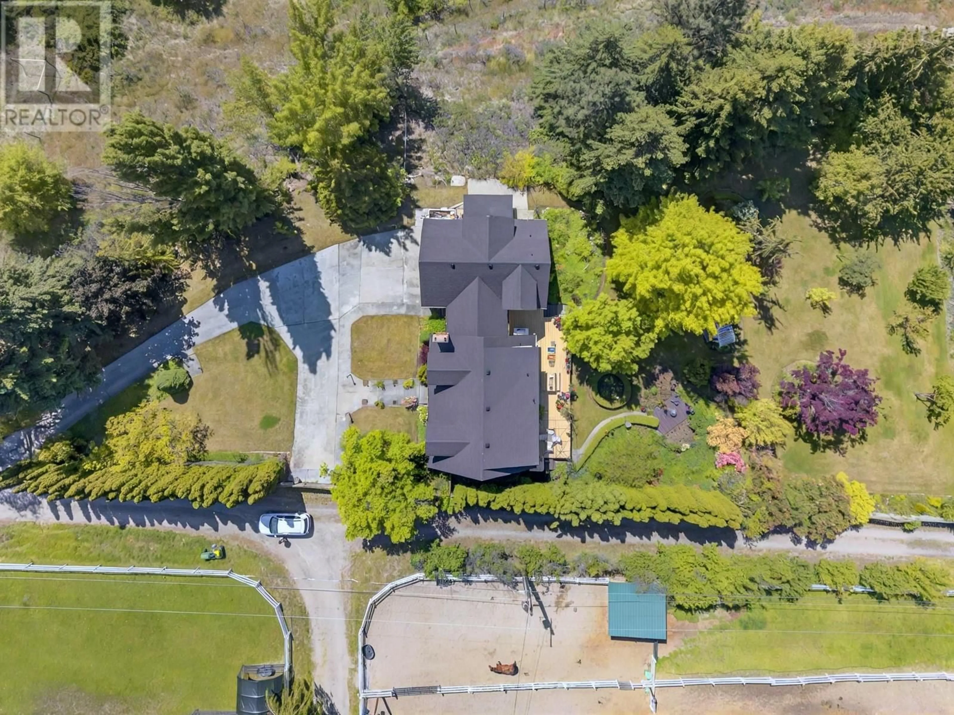 A pic from outside/outdoor area/front of a property/back of a property/a pic from drone, street for 3025 NARAMATA ROAD, Naramata British Columbia V0H1N1