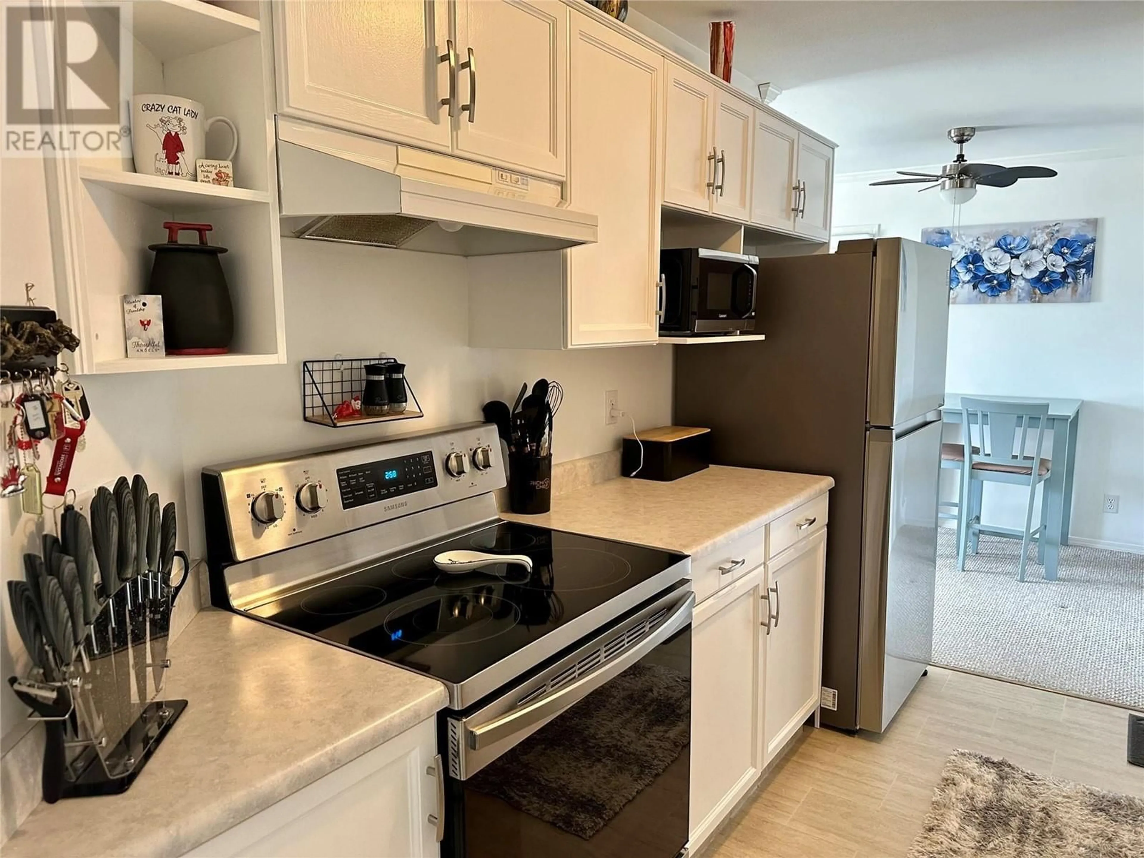 Standard kitchen, ceramic/tile floor for 217 - 650 MCKINNEY ROAD, Oliver British Columbia V0H1T3
