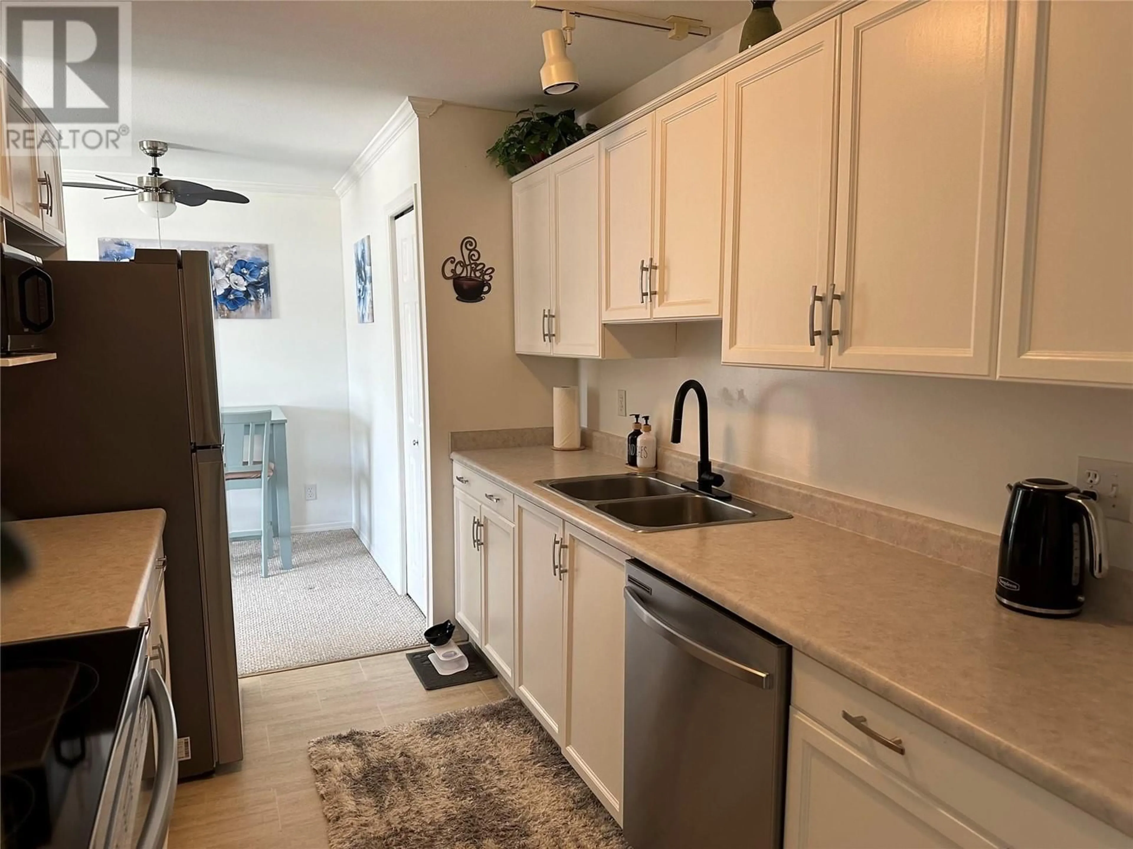 Standard kitchen, ceramic/tile floor for 217 - 650 MCKINNEY ROAD, Oliver British Columbia V0H1T3