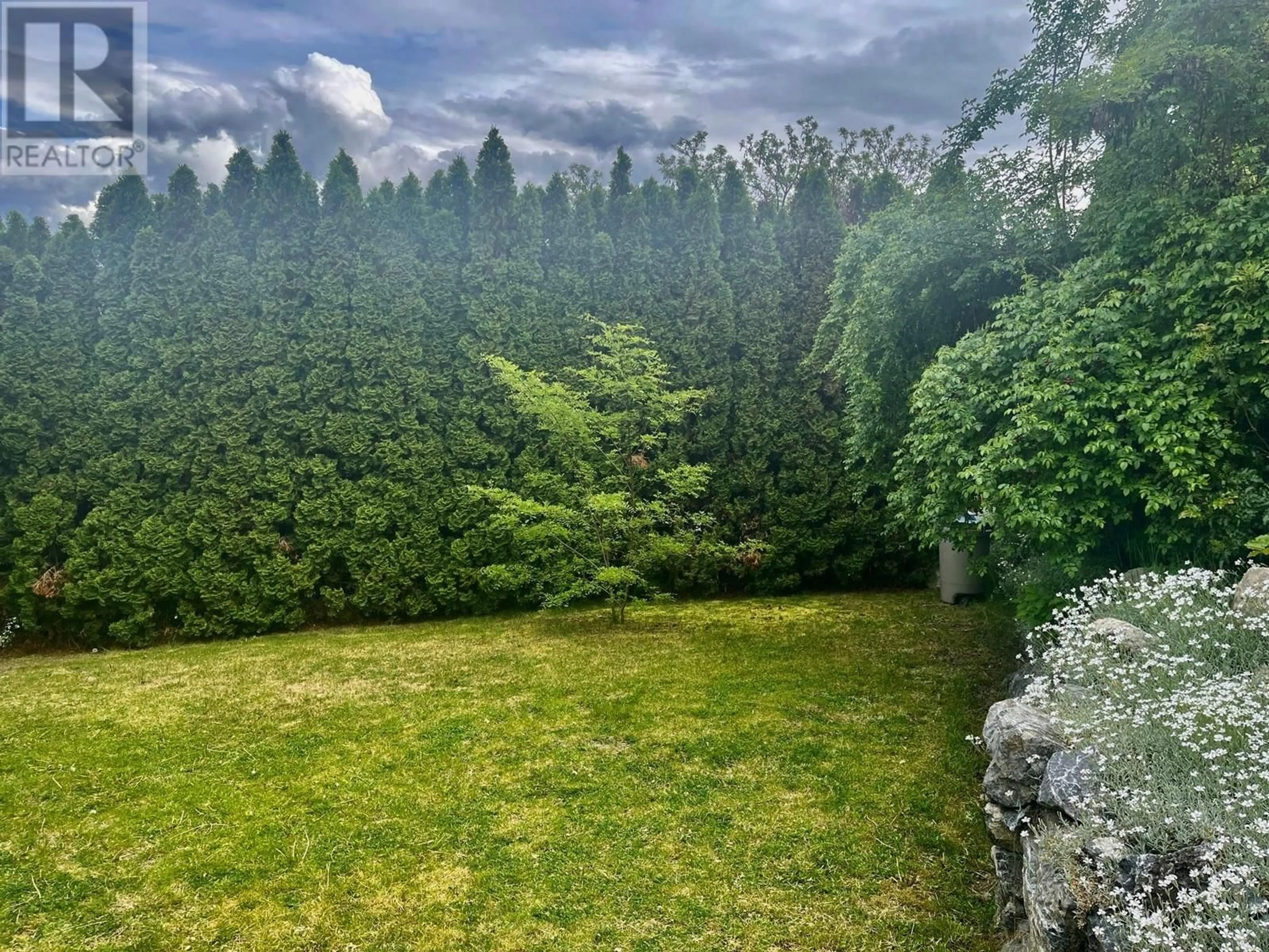 A pic from outside/outdoor area/front of a property/back of a property/a pic from drone, forest/trees view for 5813 RICHFIELD PLACE, Vernon British Columbia V1H1A6