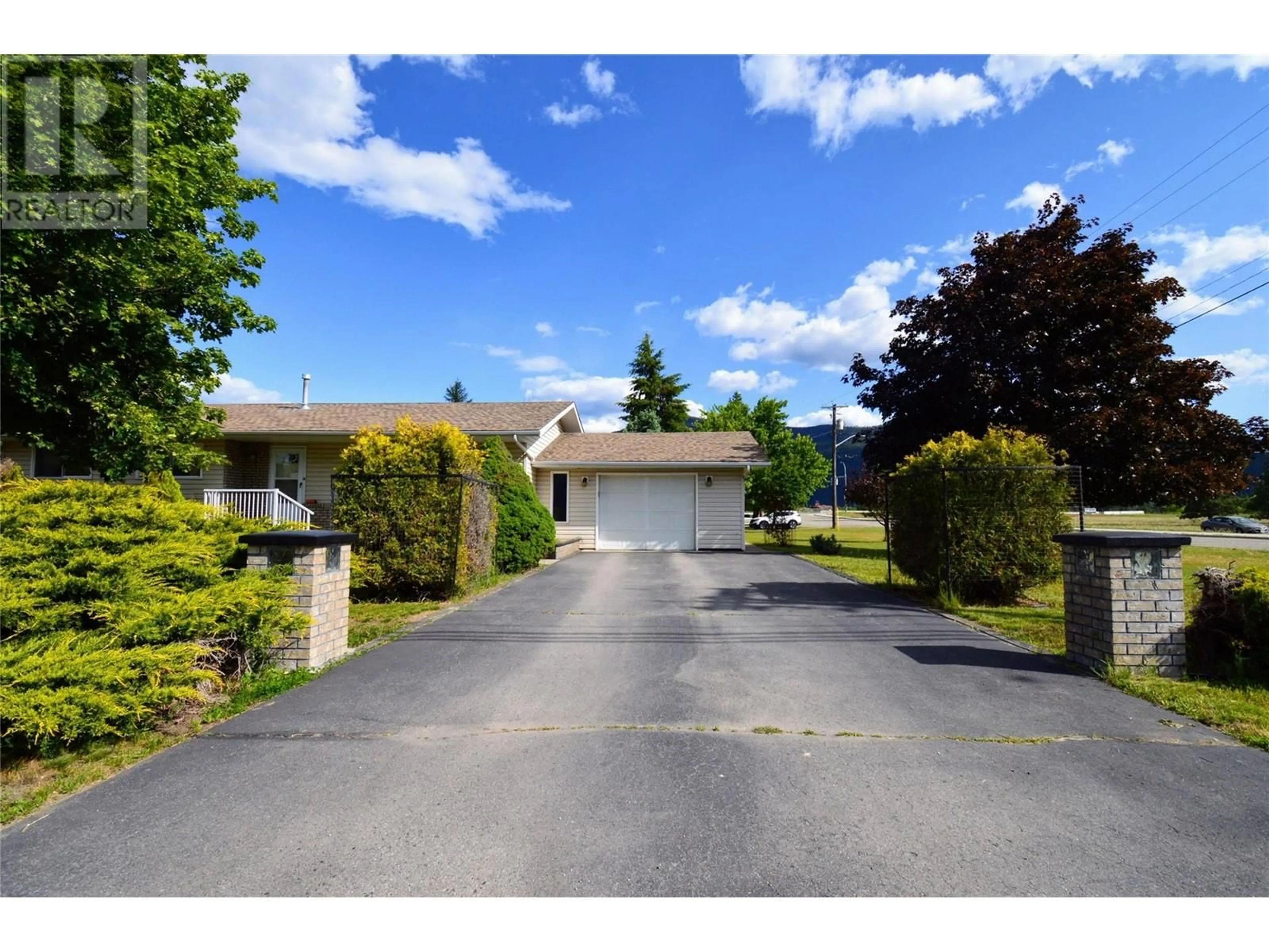 A pic from outside/outdoor area/front of a property/back of a property/a pic from drone, street for 2480 75TH AVENUE, Grand Forks British Columbia V0H1H2
