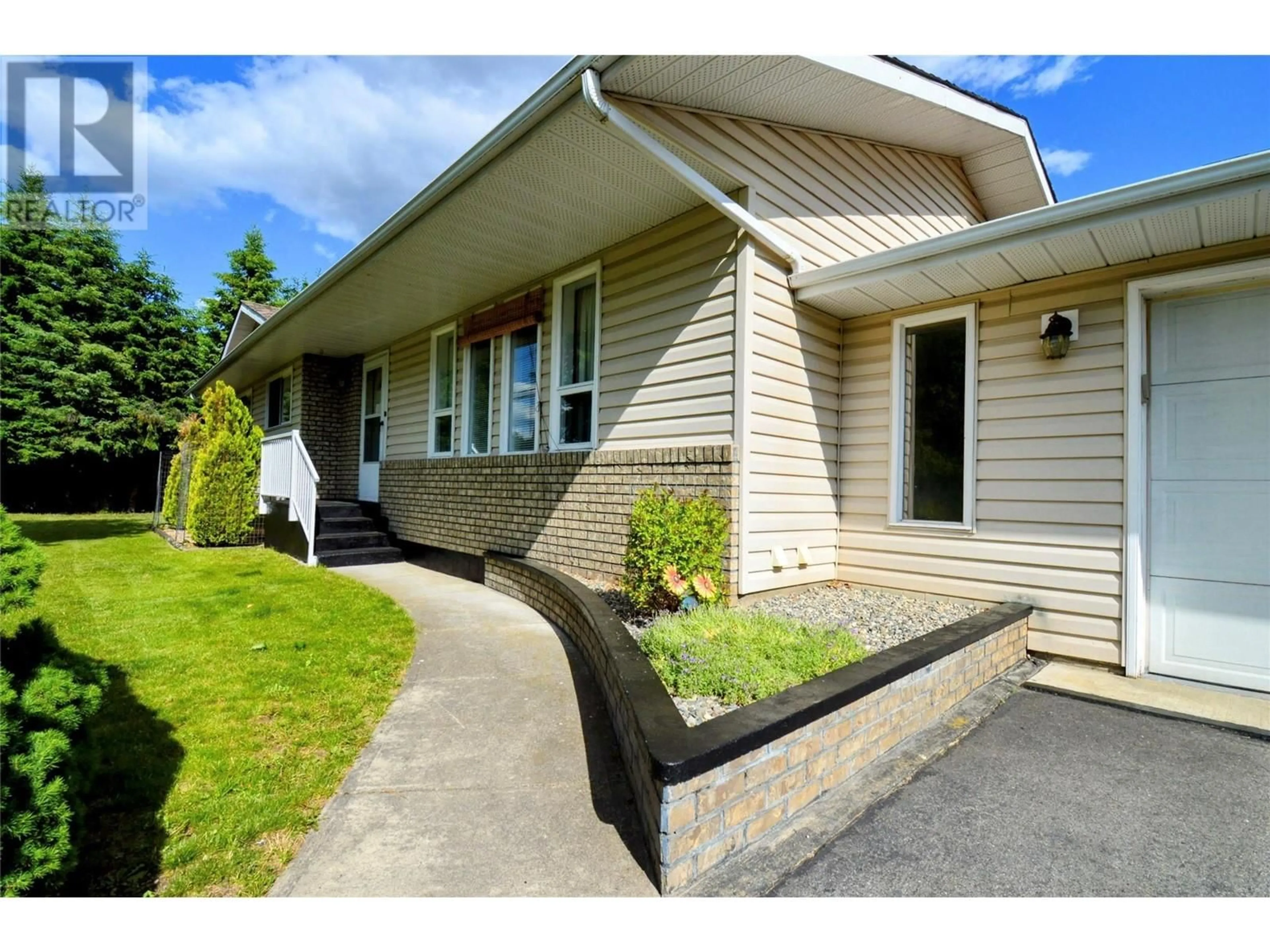 Home with vinyl exterior material, street for 2480 75TH AVENUE, Grand Forks British Columbia V0H1H2