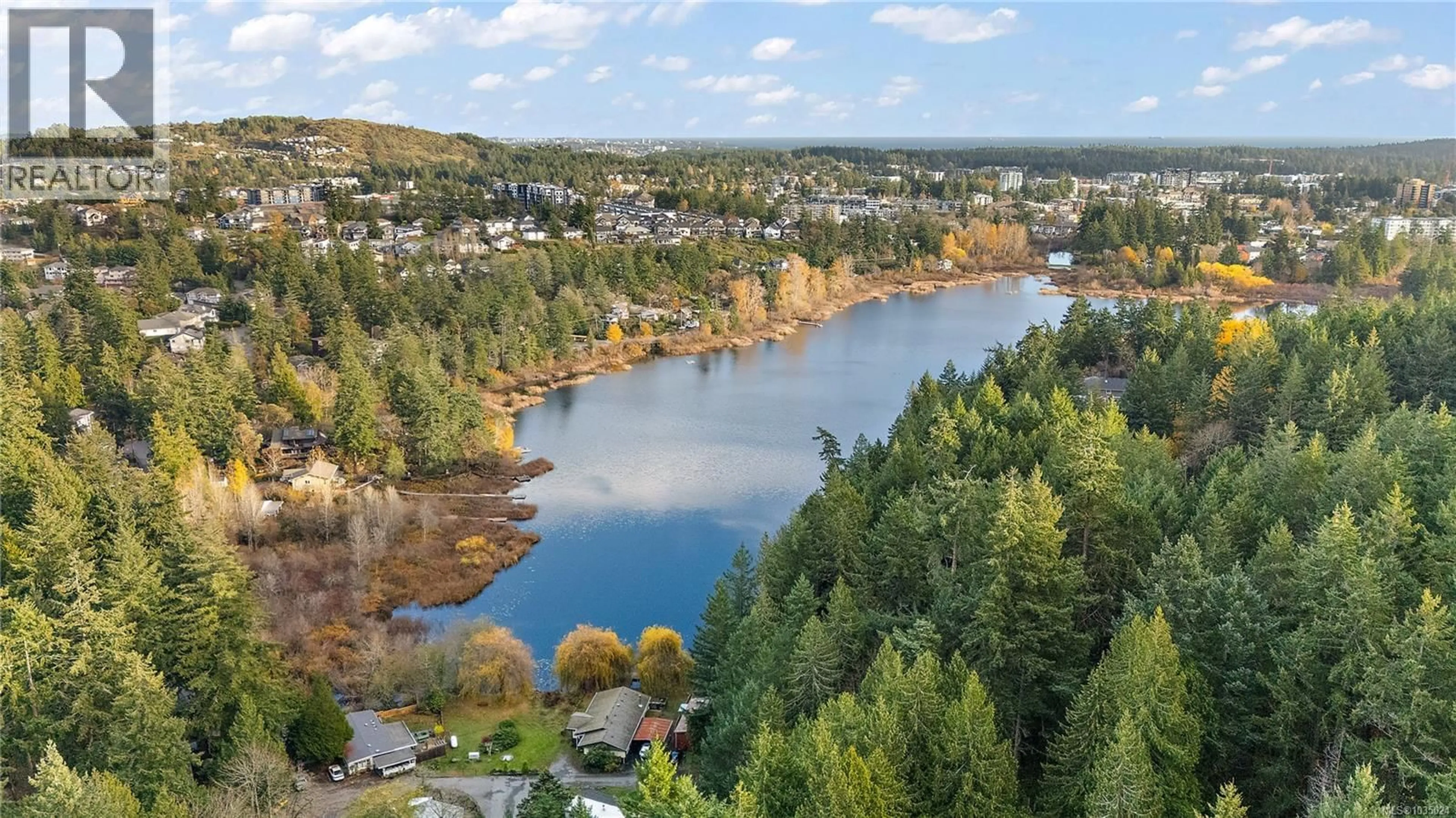 A pic from outside/outdoor area/front of a property/back of a property/a pic from drone, water/lake/river/ocean view for 119 - 2500 FLORENCE LAKE ROAD, Langford British Columbia V9B4H2
