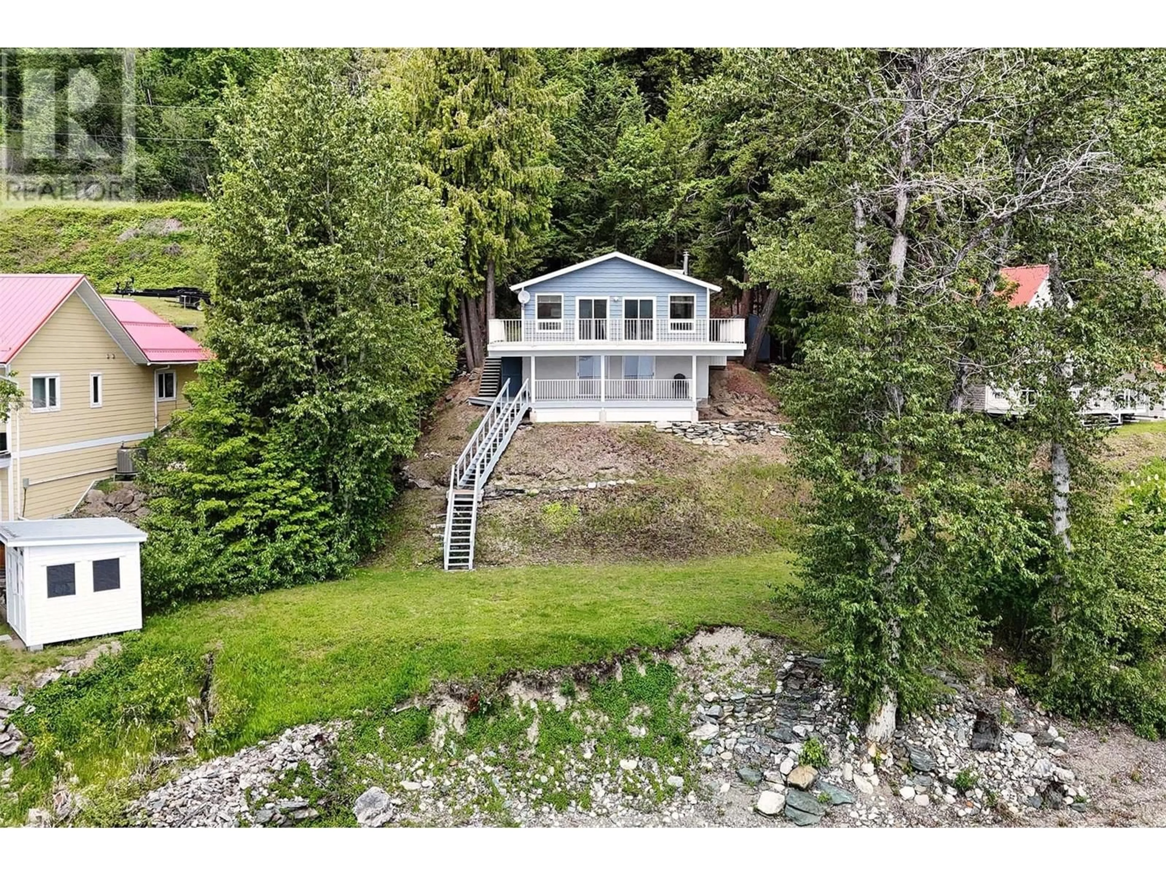 A pic from outside/outdoor area/front of a property/back of a property/a pic from drone, water/lake/river/ocean view for 8298 SQUILAX ANGLEMONT ROAD, Anglemont British Columbia V0E1M8